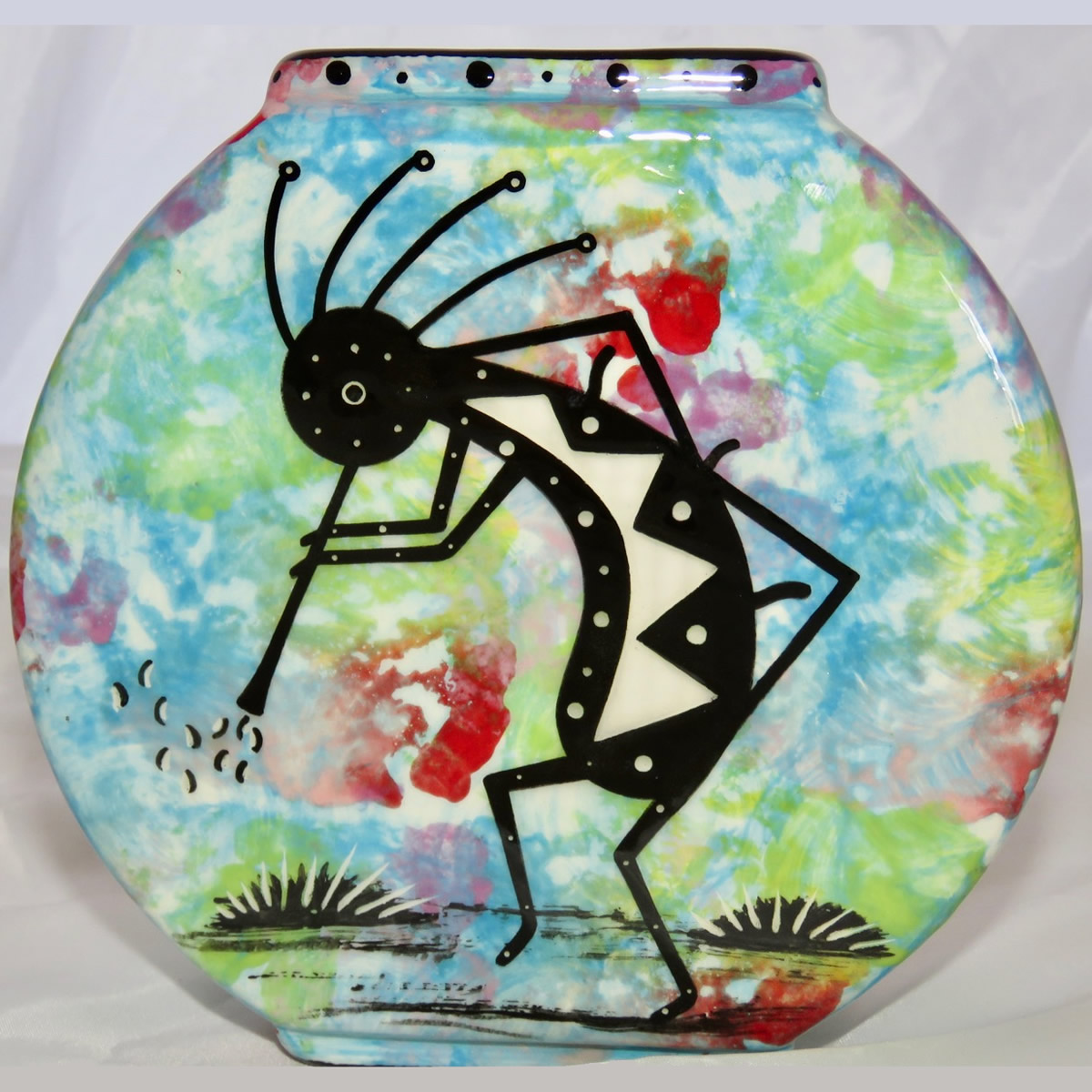 Mana Pottery pillow vase kokopelli front
