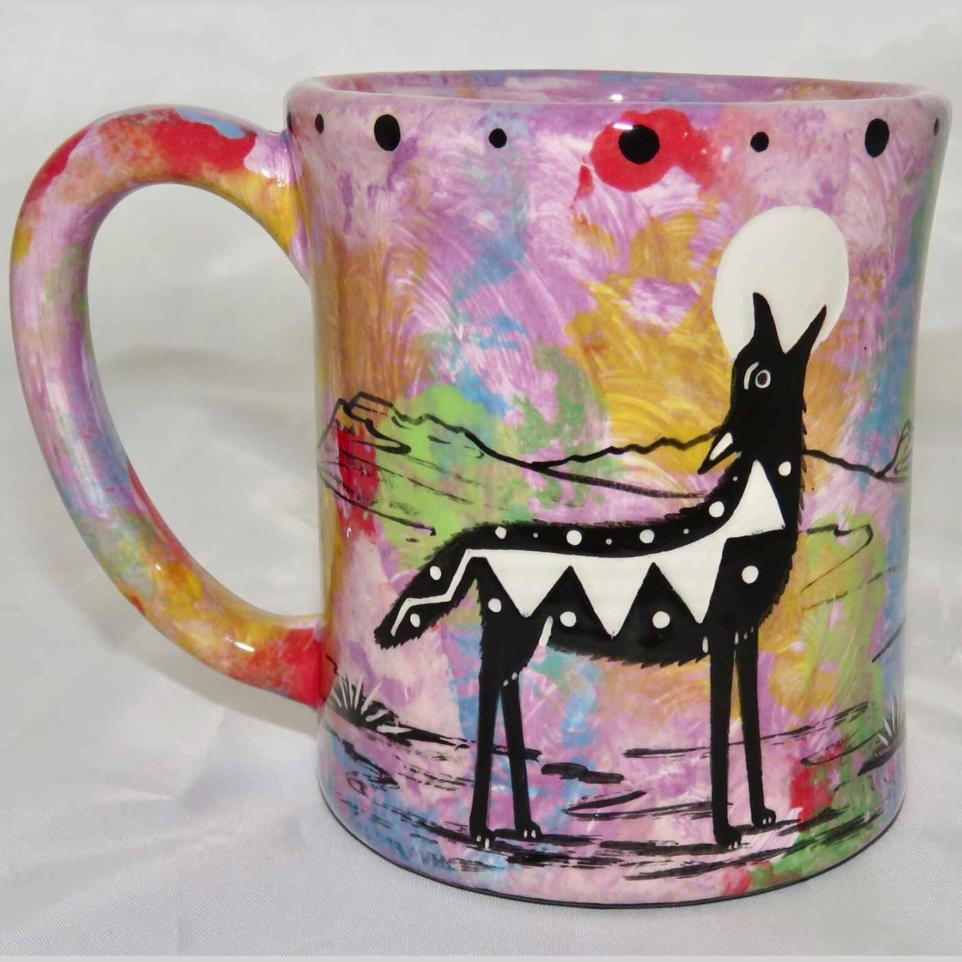 Ear handle mug, howling coyote, purple background.
