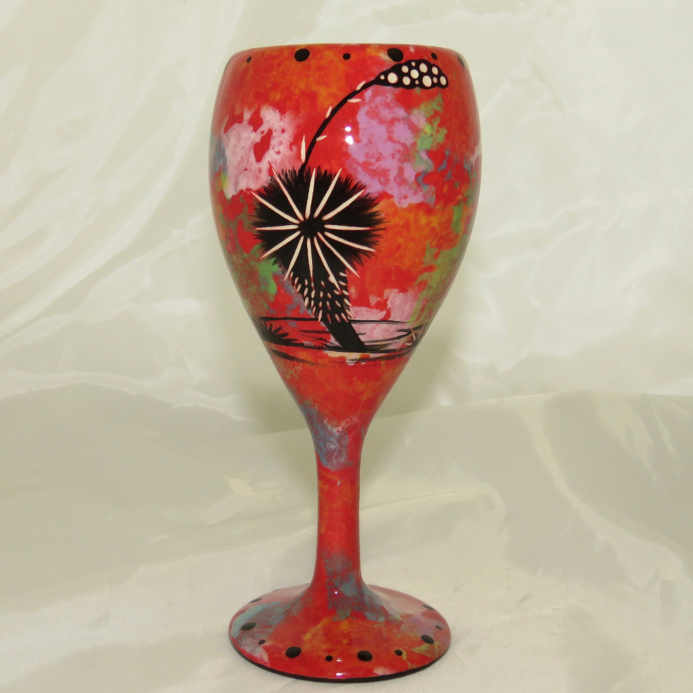 Wine glass with horse on crimson - REVERSE, showing Aravaipa vegetation