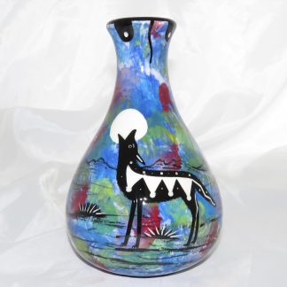 Mana Pottery Teardrop Vase with coyote on one side and native Aravaipa vegetation on reverse.