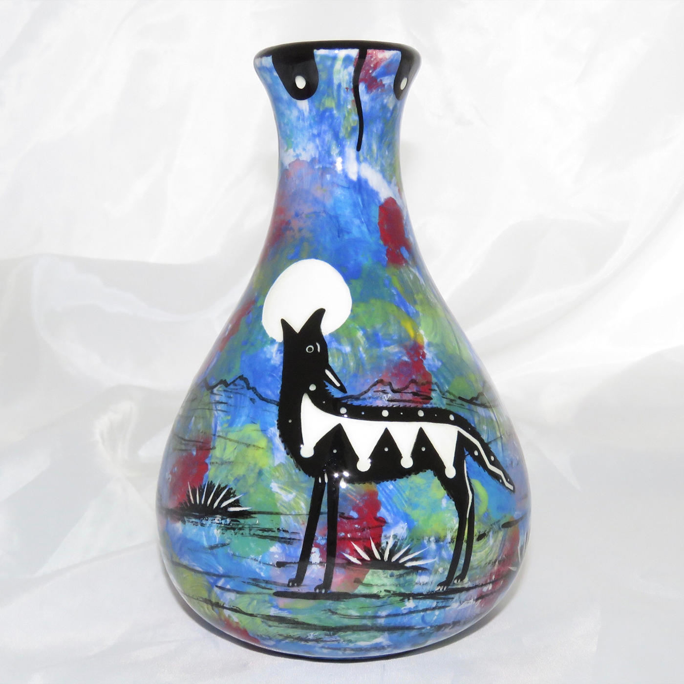 Mana Pottery Teardrop Vase with coyote on one side and native Aravaipa vegetation on reverse.