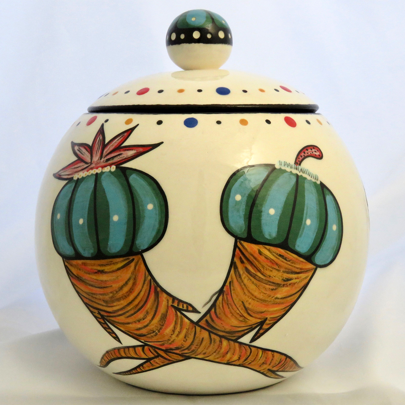 Mana Pottery canister with Peyote roots on one side and Firebird on reverse and confetti interior.
