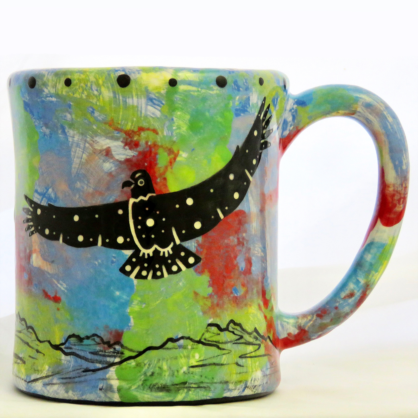 Mana Pottery e-mug with hawk on blue background