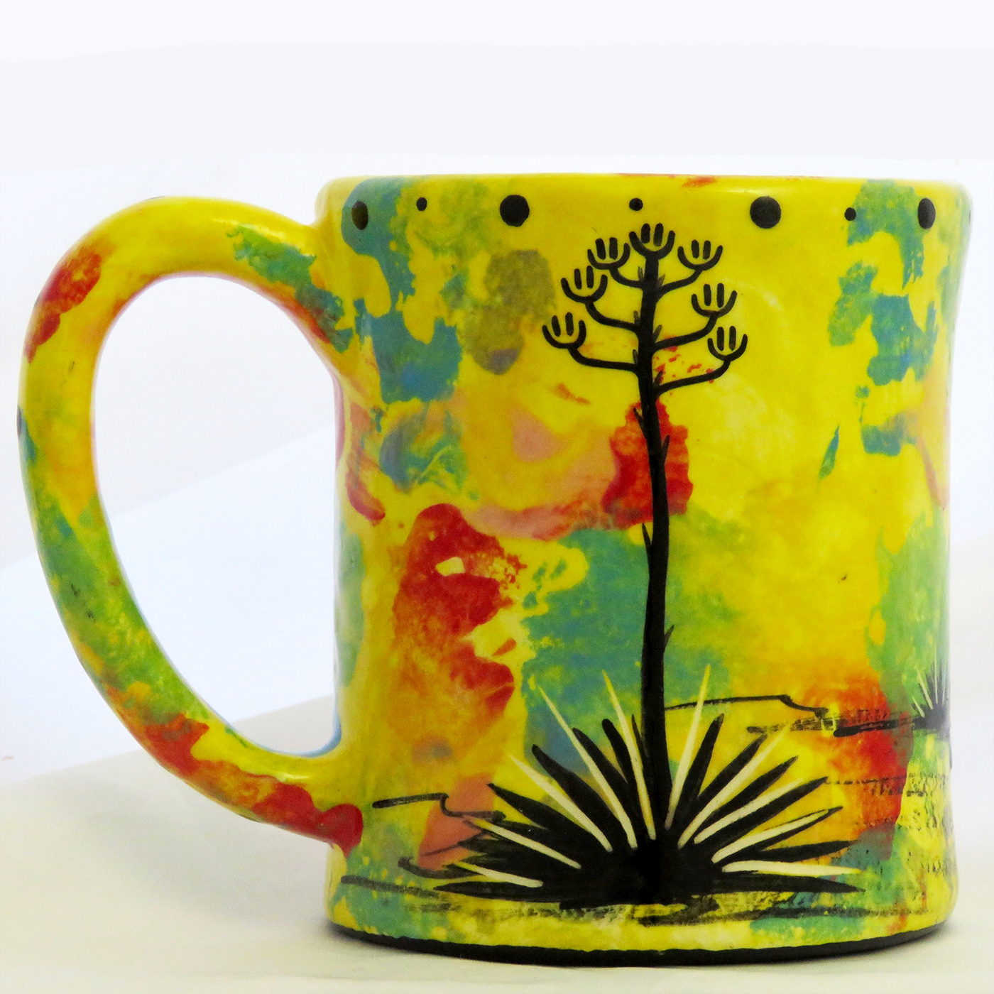Mana Pottery e-mug with running deer on bright yellow background. Reverse side shows Aravaipa desert vegetation.