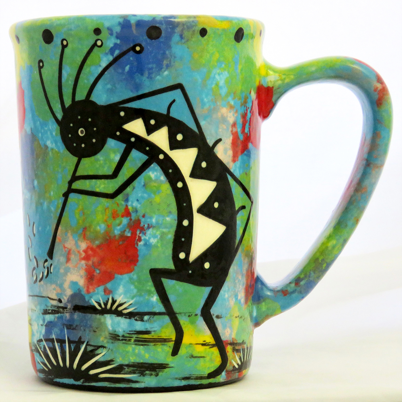 Large mug with kokopelli on turquoise blue