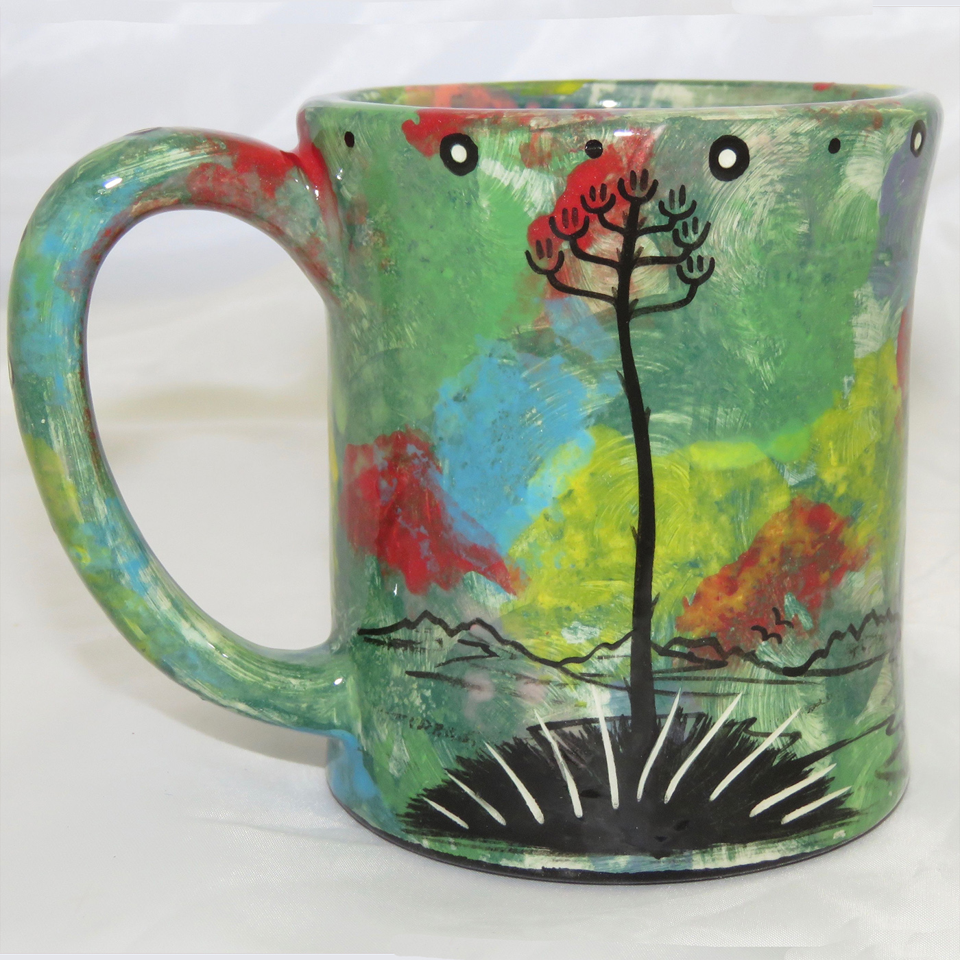 Mana Pottery e-mug featuring gecko on one side and native Aravaipa vegetation on reverse, on green background.