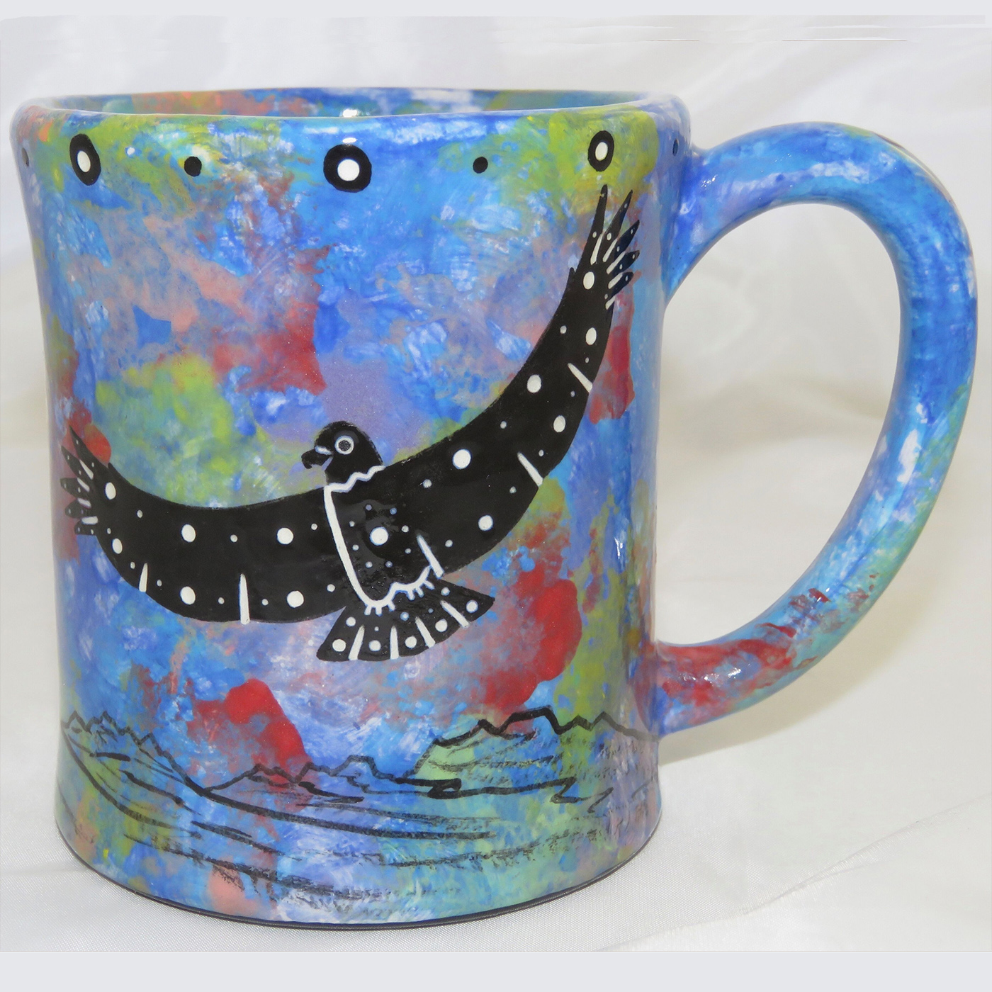 Mana Pottery e-mug featuring hawk on one side and native Aravaipa vegetation on reverse, on blue background.