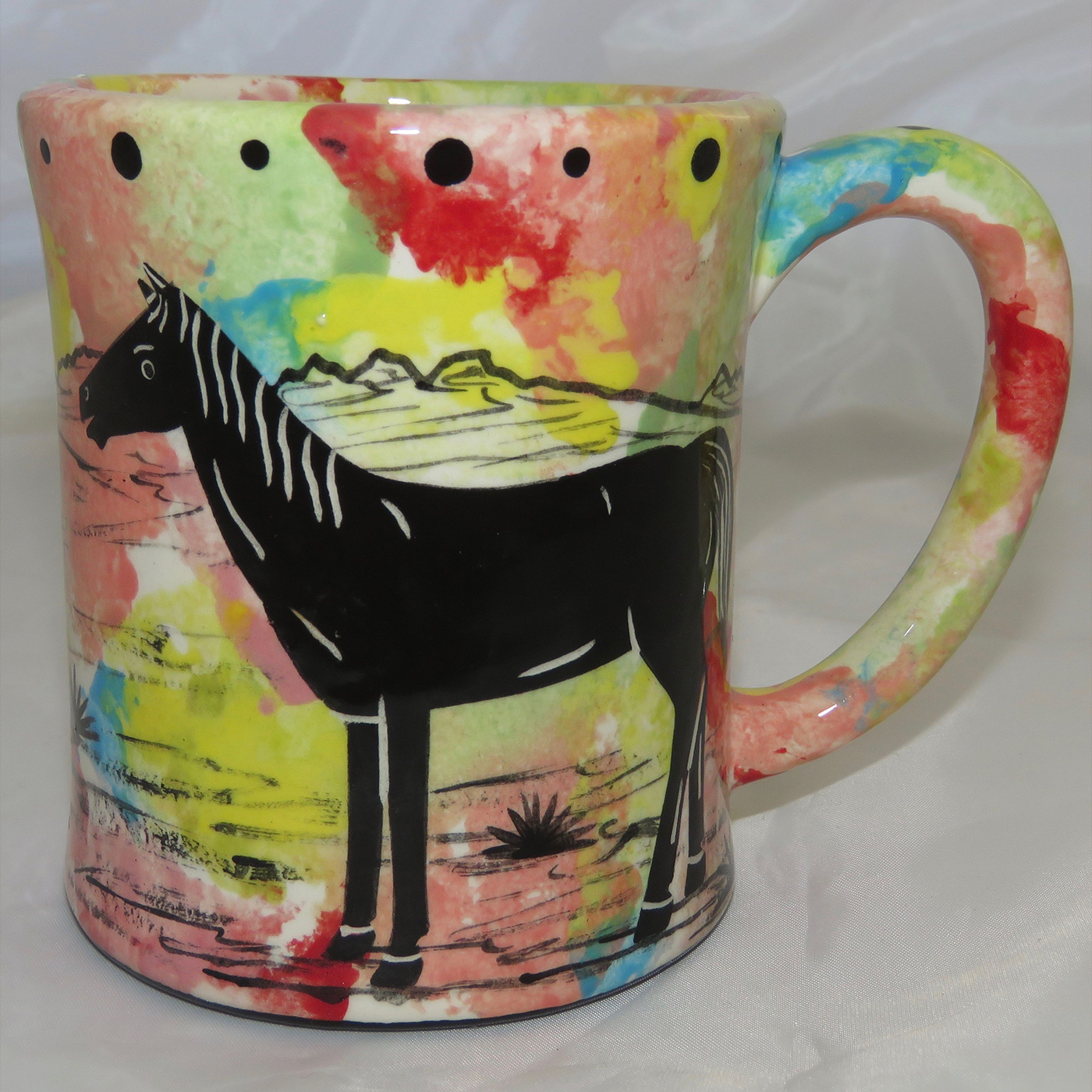 Mana Pottery e-mug featuring horse on one side and native Aravaipa vegetation on reverse, on confetti background.