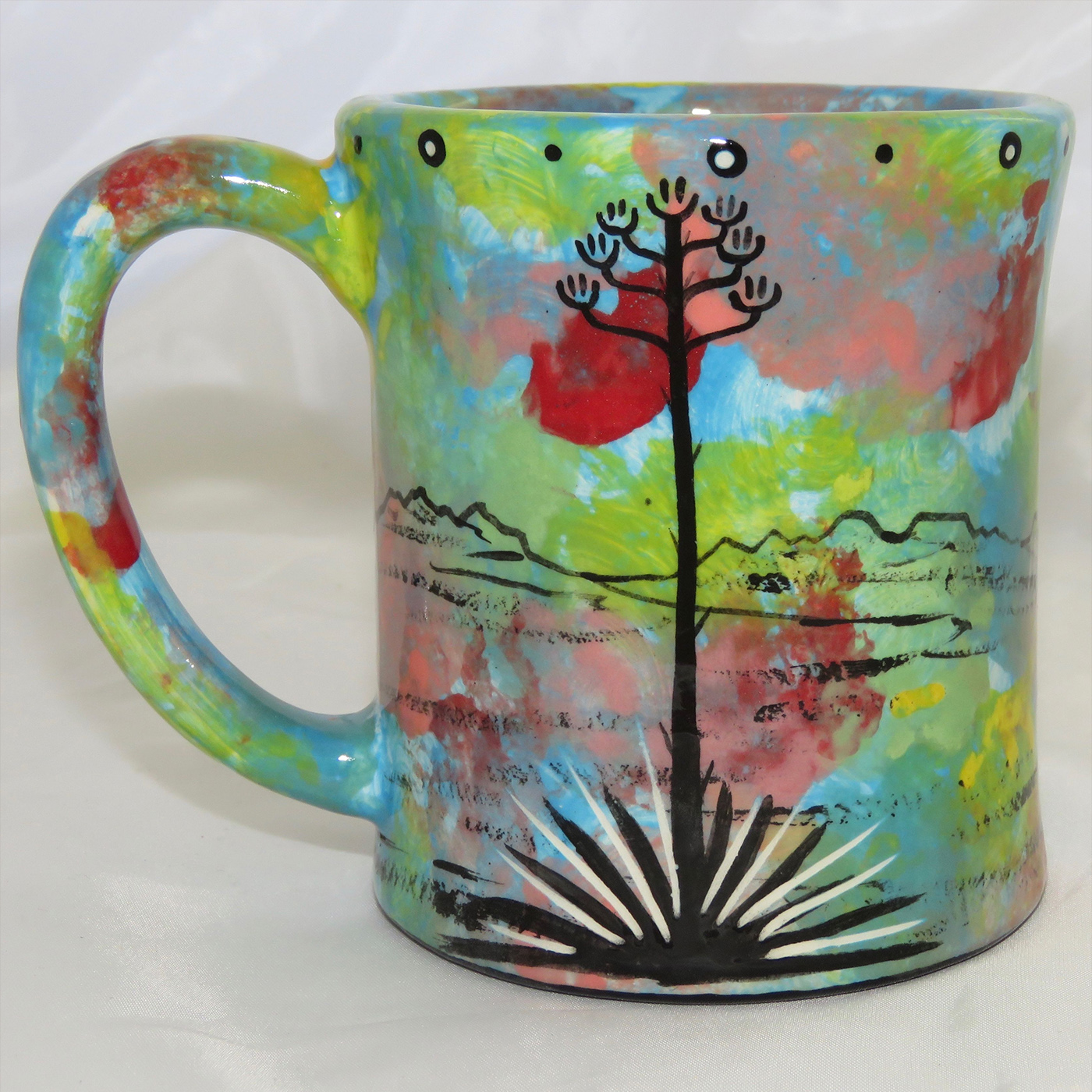 Mana Pottery e-mug featuring quail on one side and native Aravaipa vegetation on reverse, on turquoise blue background.