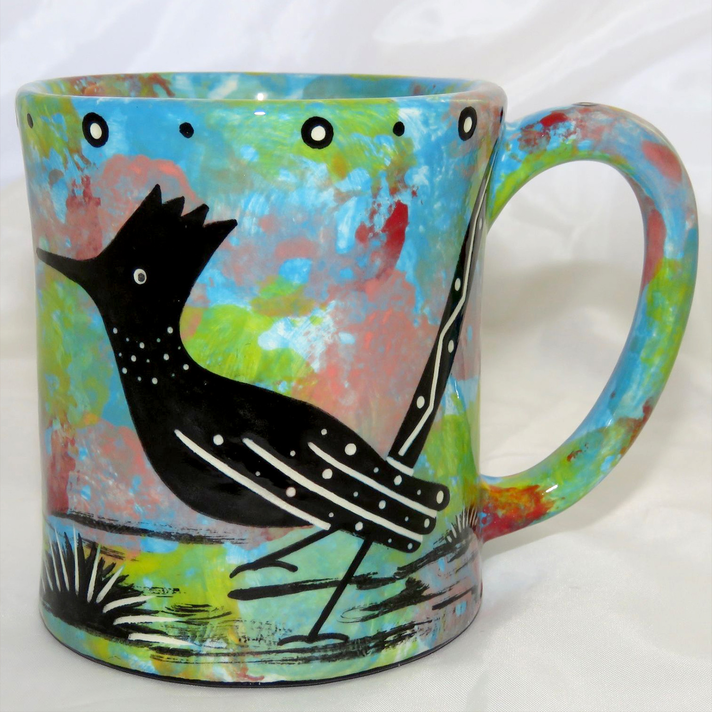 Mana Pottery e-mug featuring roadrunner on one side and native Aravaipa vegetation on reverse, on turquoise blue background.