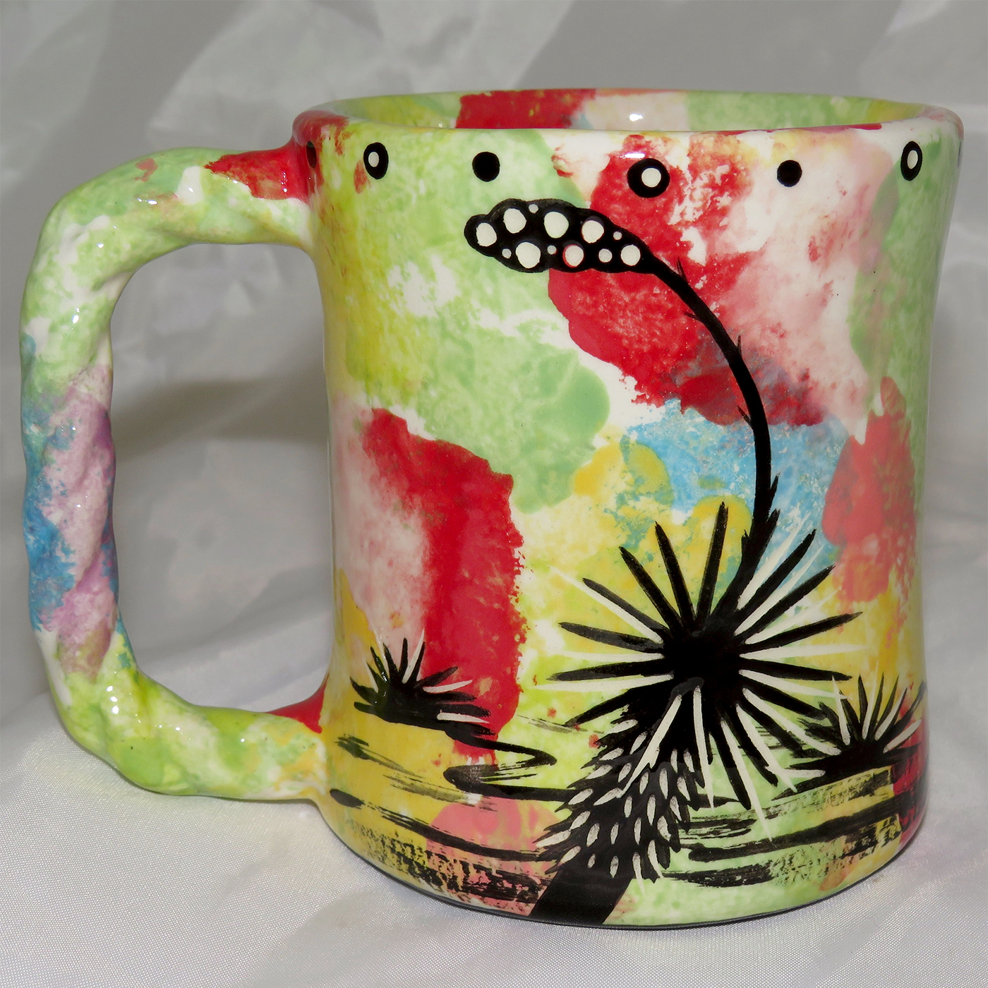 Mana Pottery Rope Mug featuring bear on one side and desert vegetation on reverse.