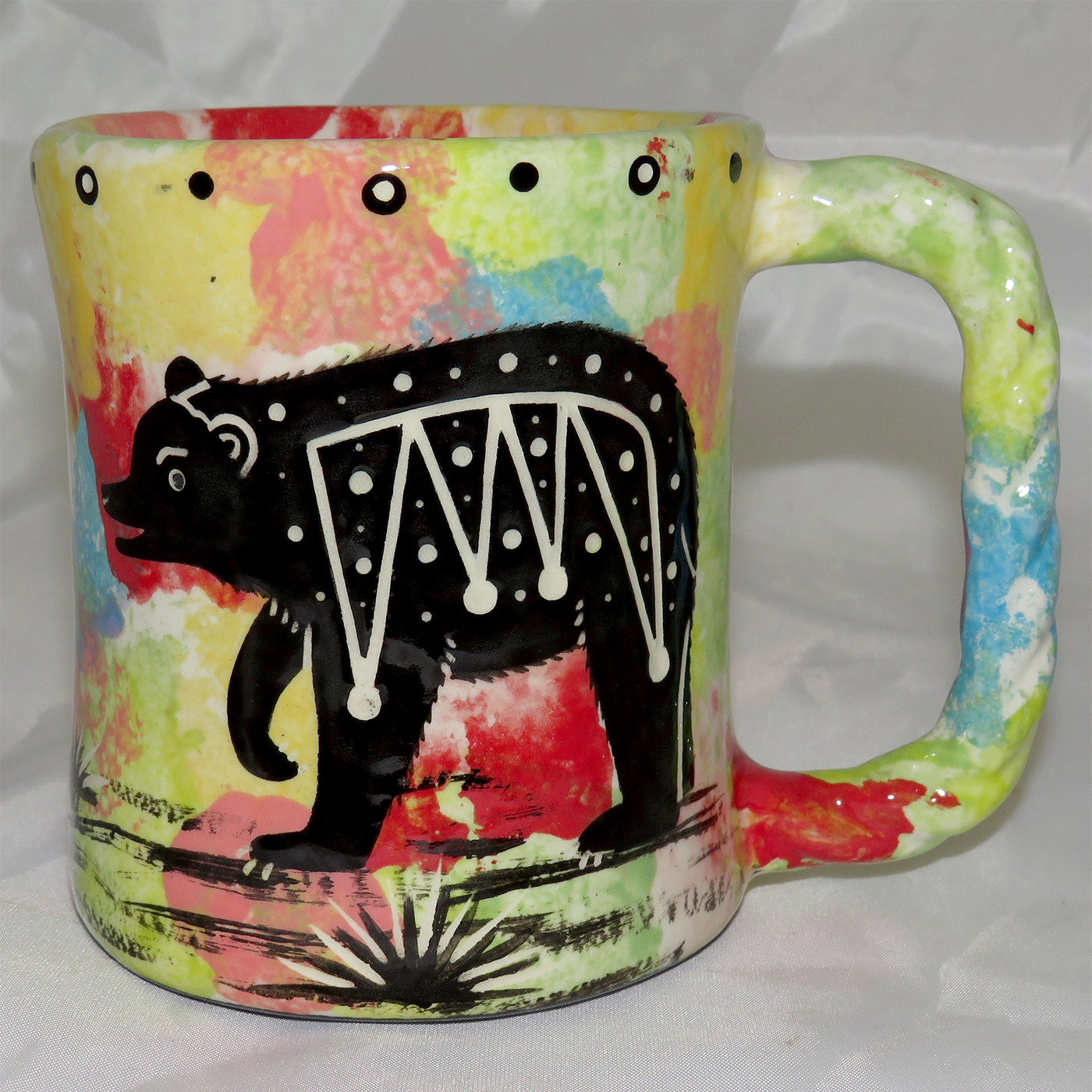 Mana Pottery Rope Mug featuring bear on one side and desert vegetation on reverse.