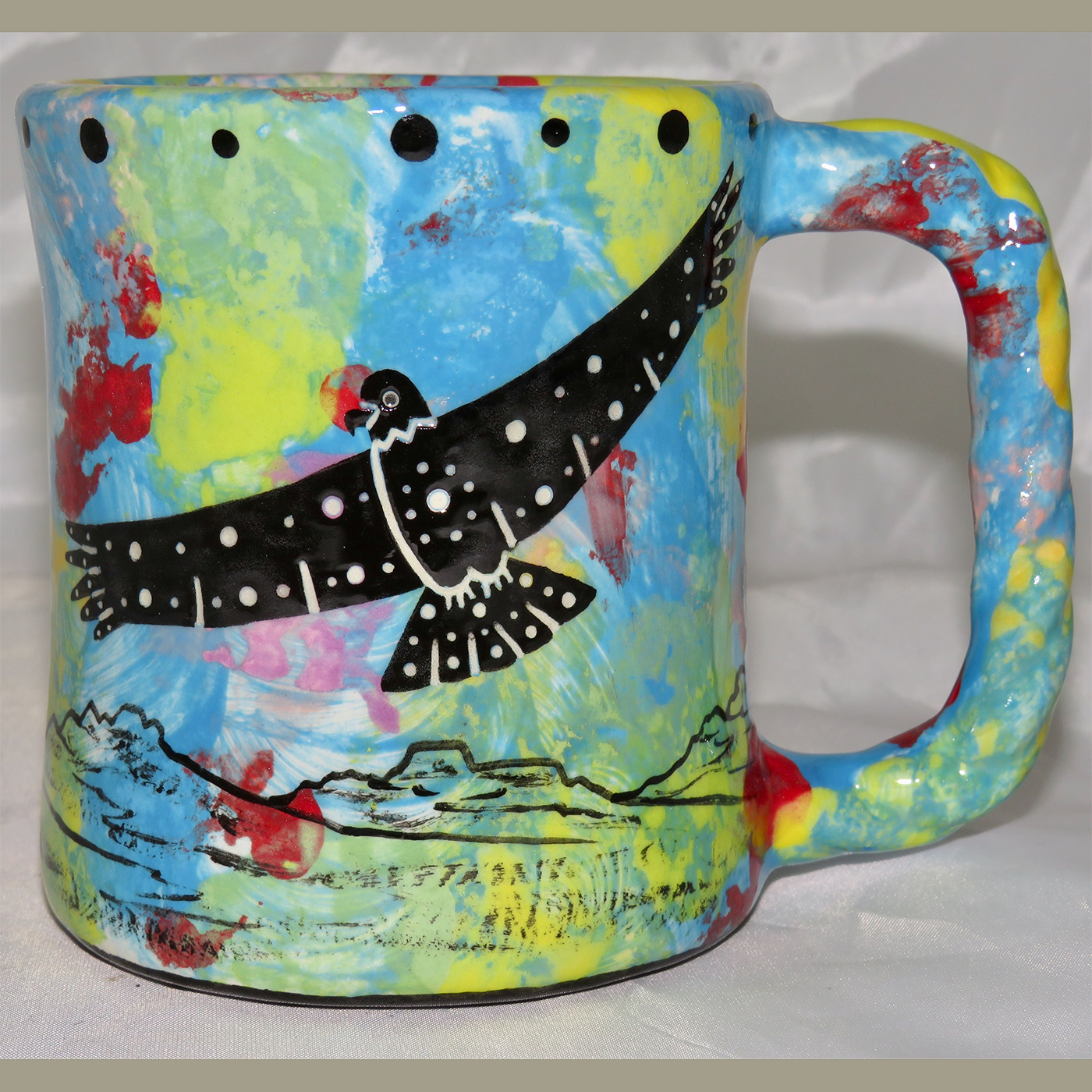 Mana Pottery Rope Mug featuring hawk in flight on one side and desert vegetation on reverse.