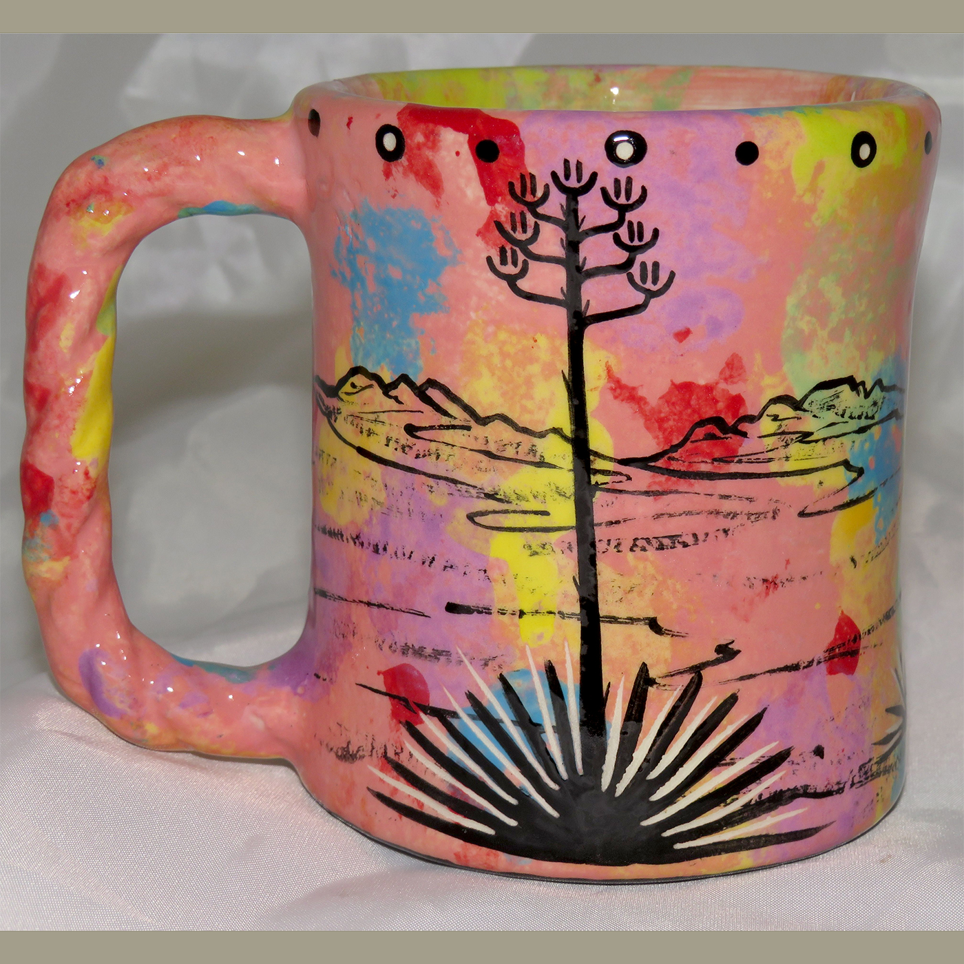 Mana Pottery Rope Mug featuring javelina on one side and desert vegetation on reverse.