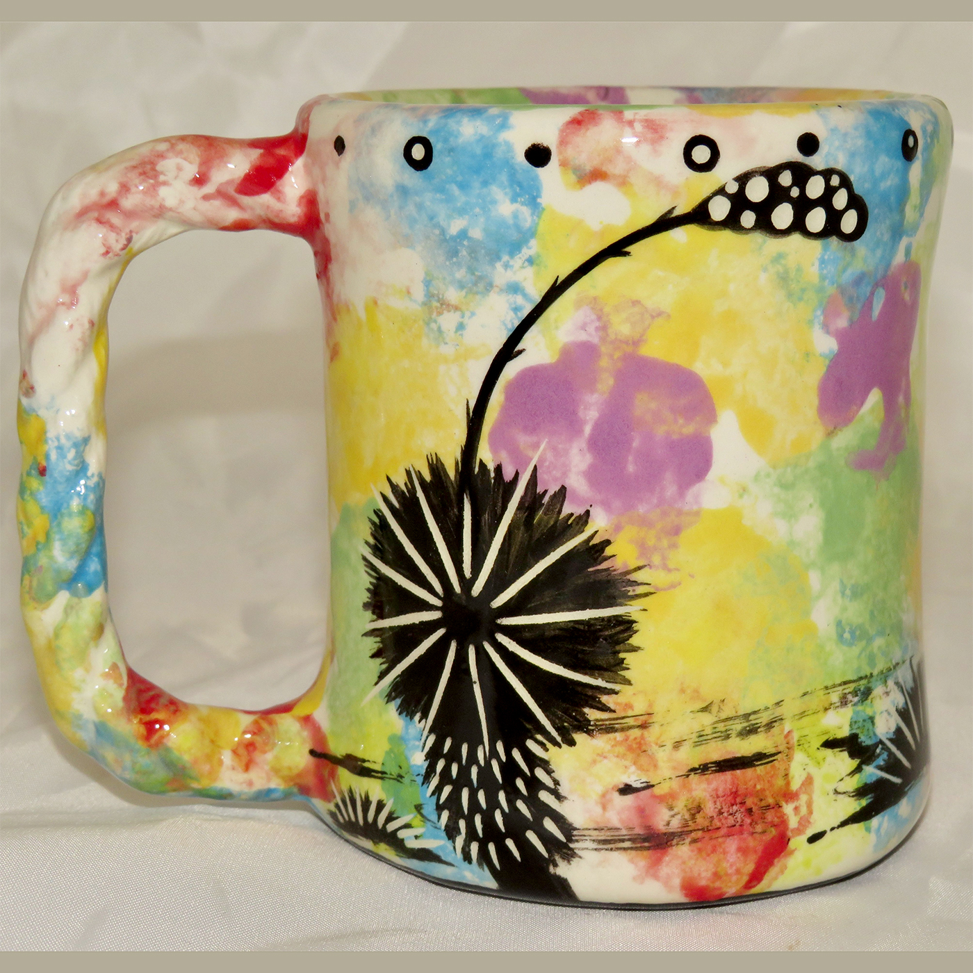 Mana Pottery Rope Mug featuring roadrunner on one side and desert vegetation on reverse.
