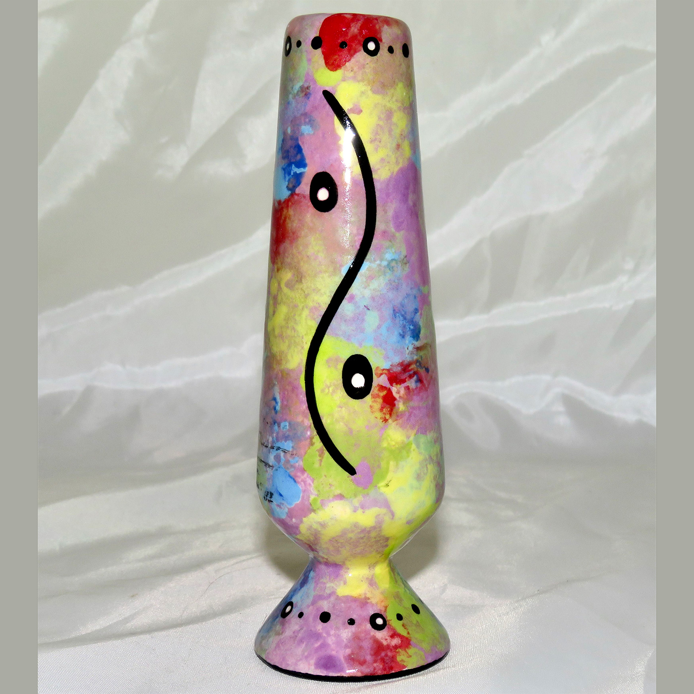 Mana Pottery bud vase featuring quail with schematic design on reverse, on purple accented background.