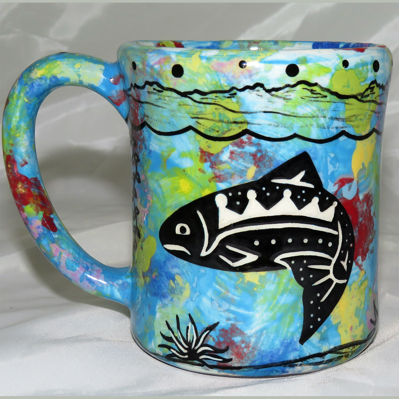 Mana Pottery e-mug featuring salmon with underwater-scape on reverse.