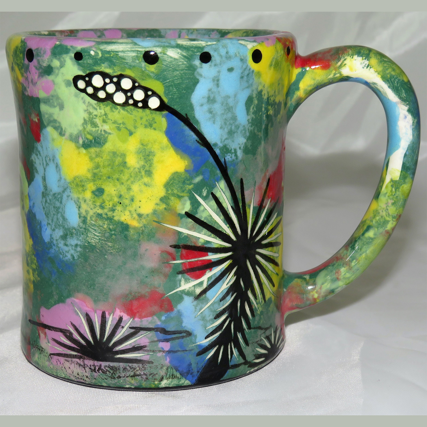 Mana Pottery e-mug featuring toad with desert landscape on reverse.