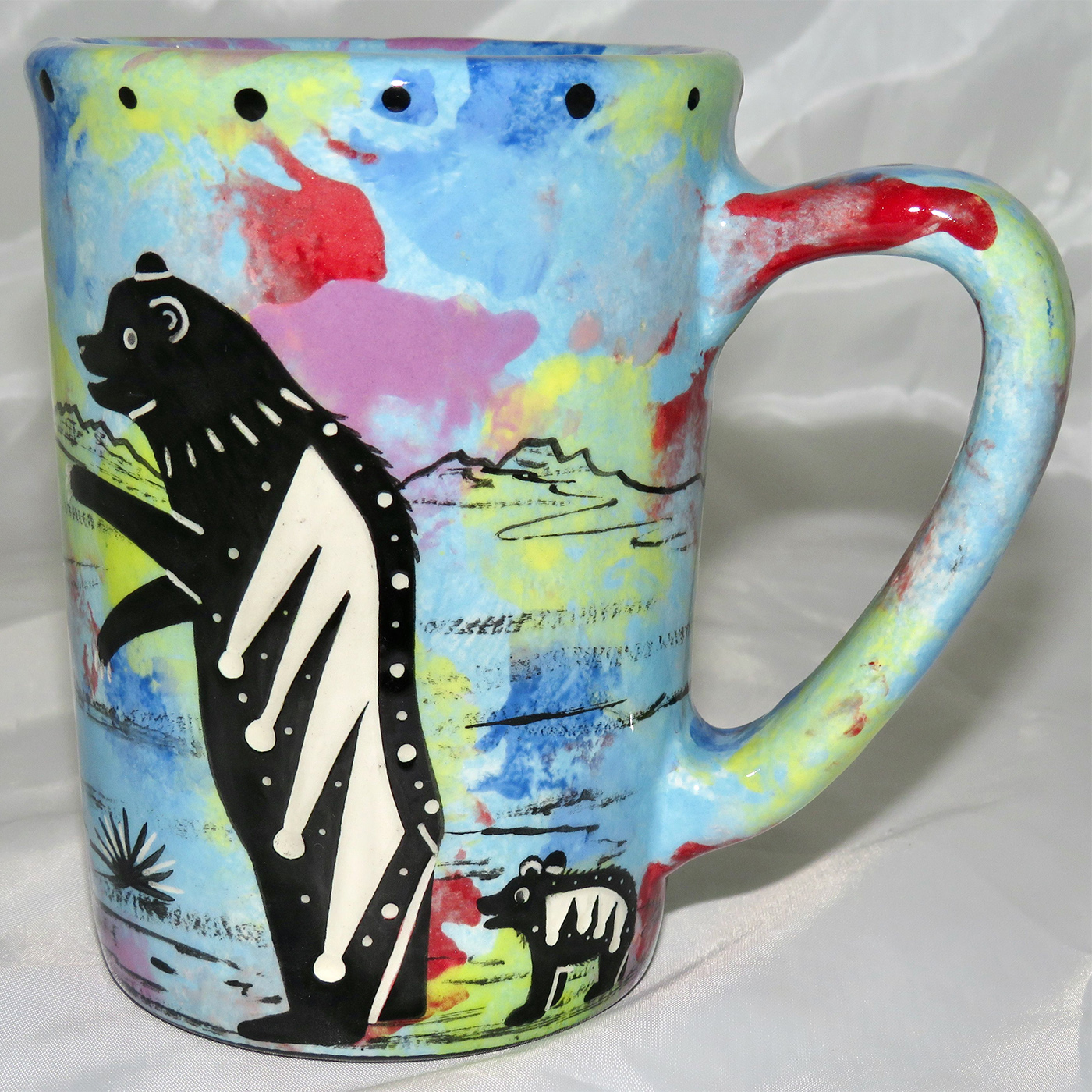 Mana Pottery large mug featuring bear with cub and desert landscape on reverse.