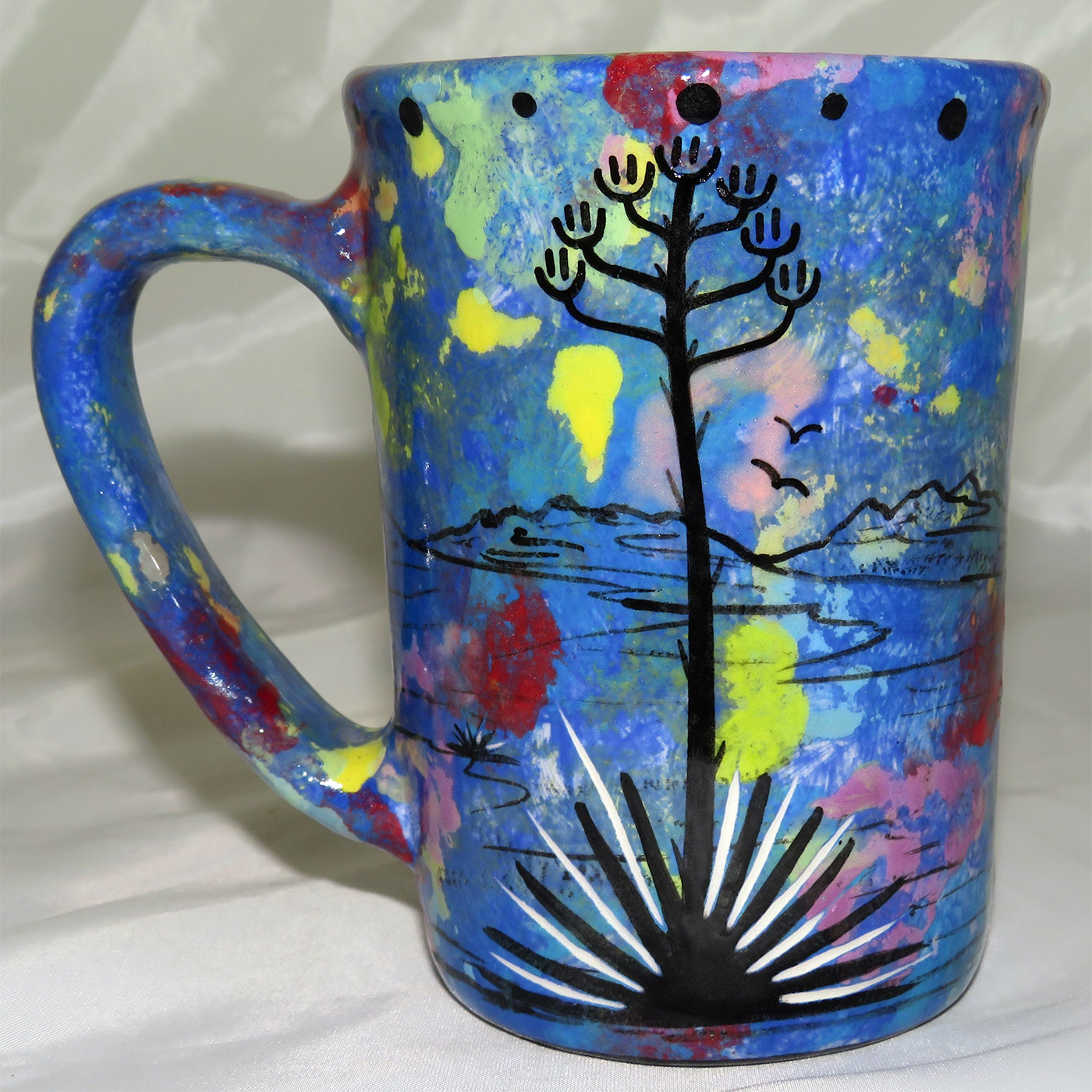 Mana Pottery large mug featuring coyote and desert landscape on reverse.