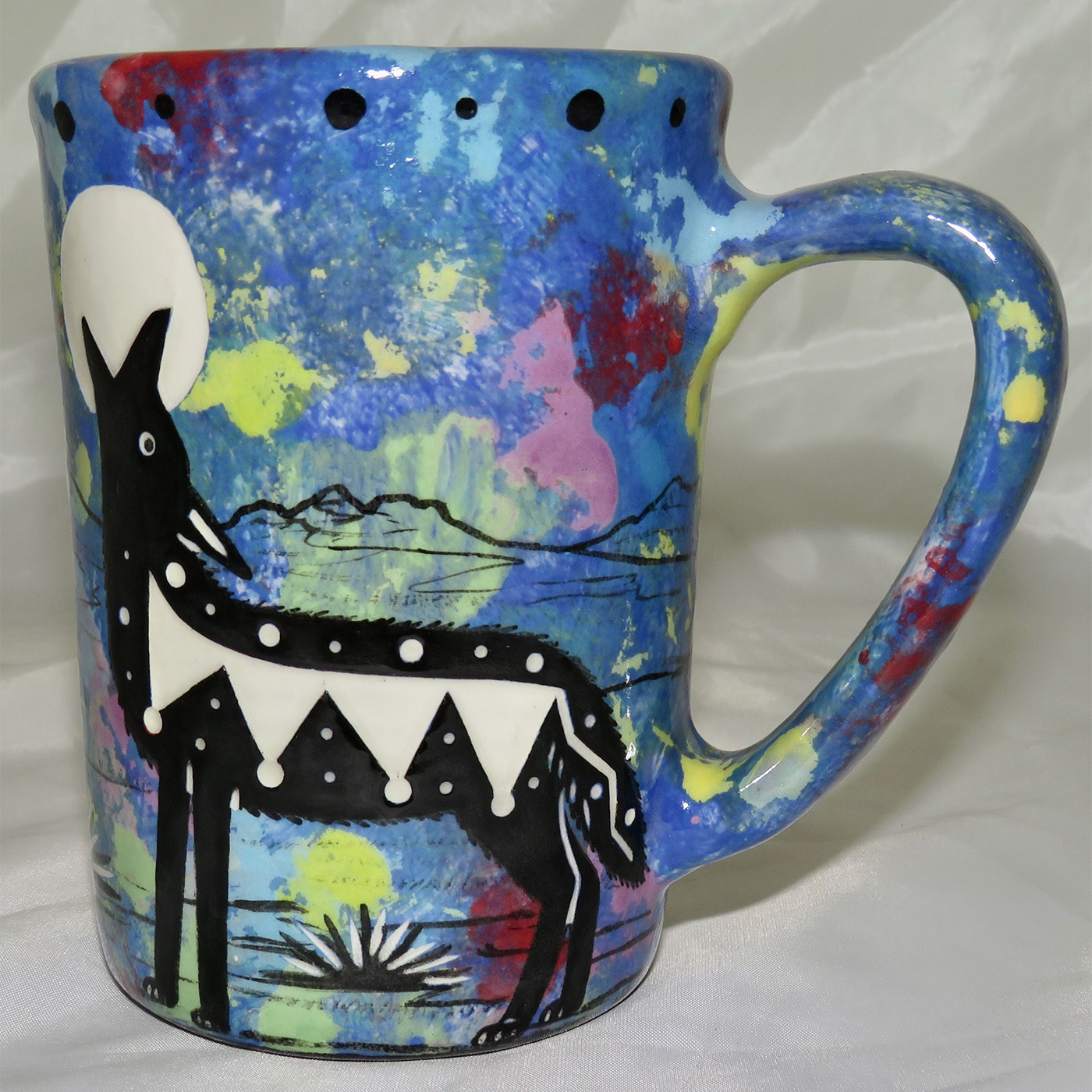 Mana Pottery large mug featuring coyote and desert landscape on reverse.