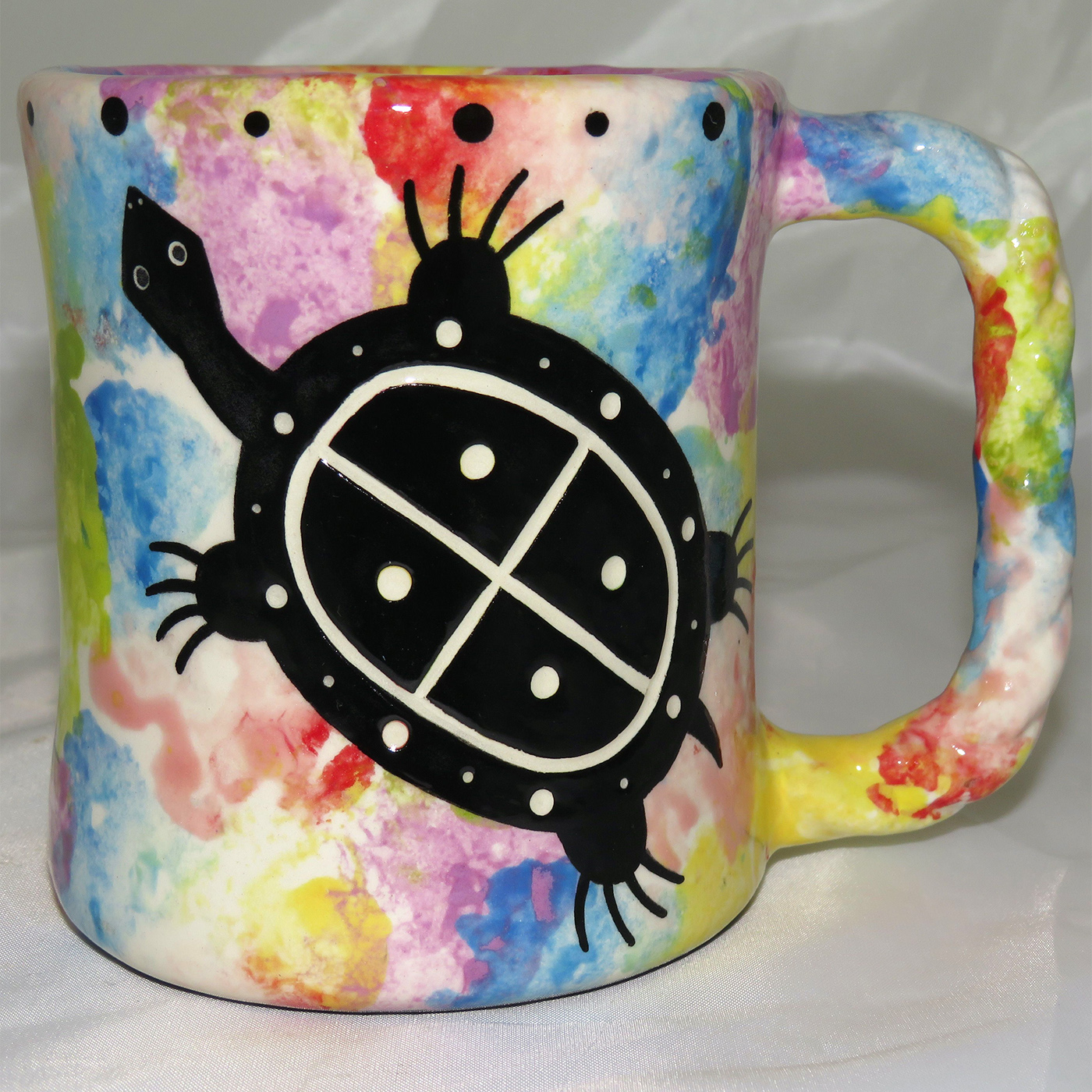 Mana Pottery rope mug featuring turtle and desert landscape on reverse.