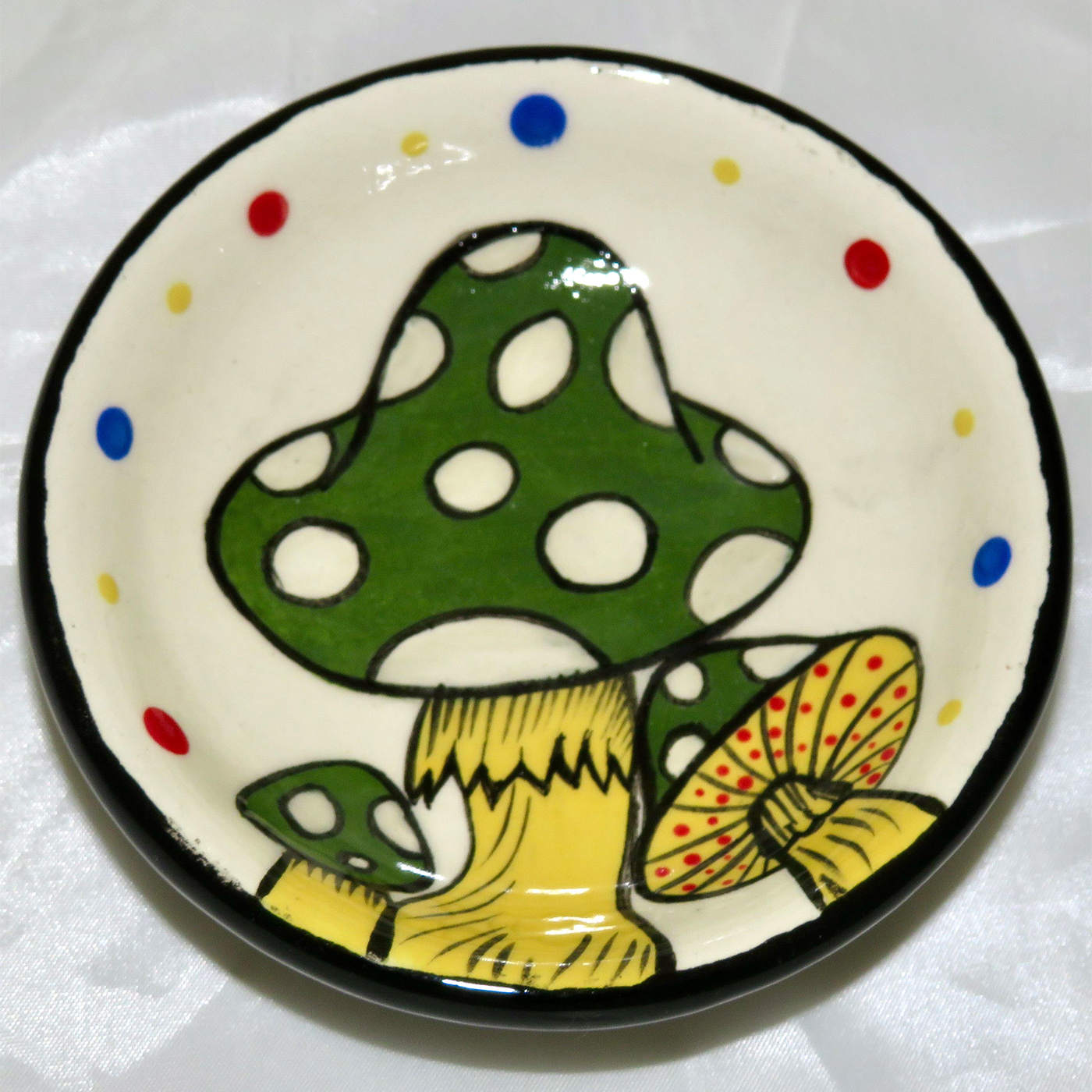 Mana Pottery teabag holder featuring Amanita mushrooms with green caps