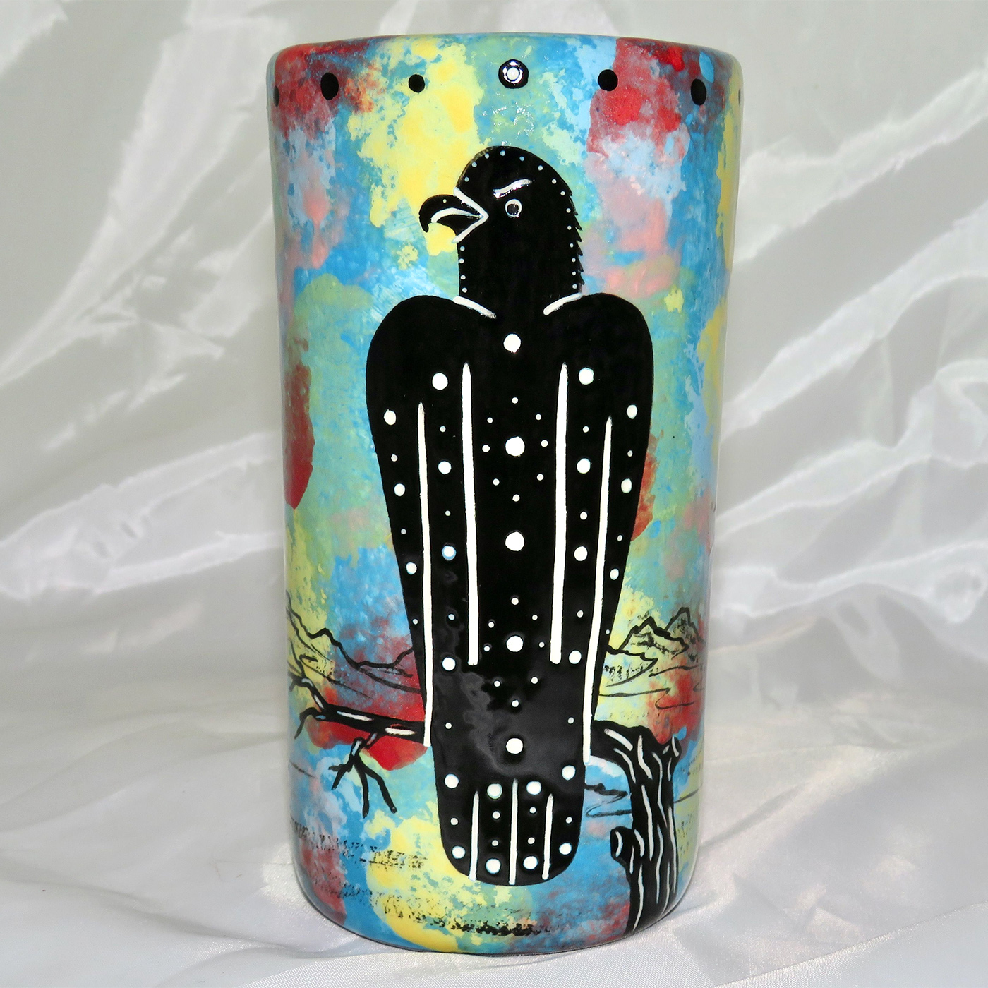Mana Pottery tumbler featuring hawk and desert landscape on reverse.