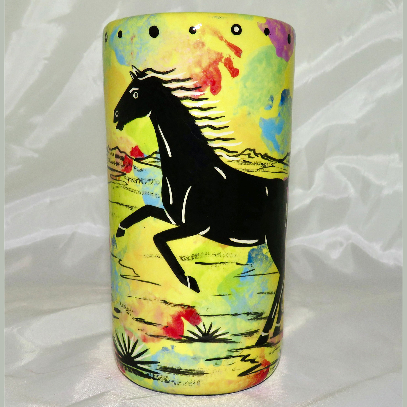 Mana Pottery tumbler featuring horse and desert landscape on reverse.