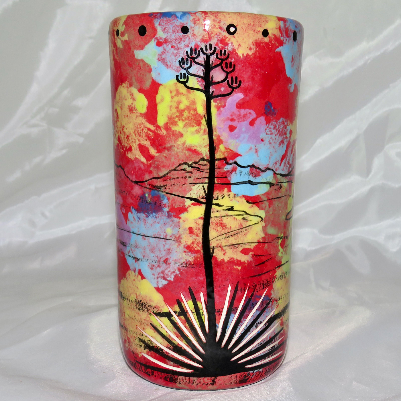 Mana Pottery tumbler featuring deer and desert landscape on reverse.