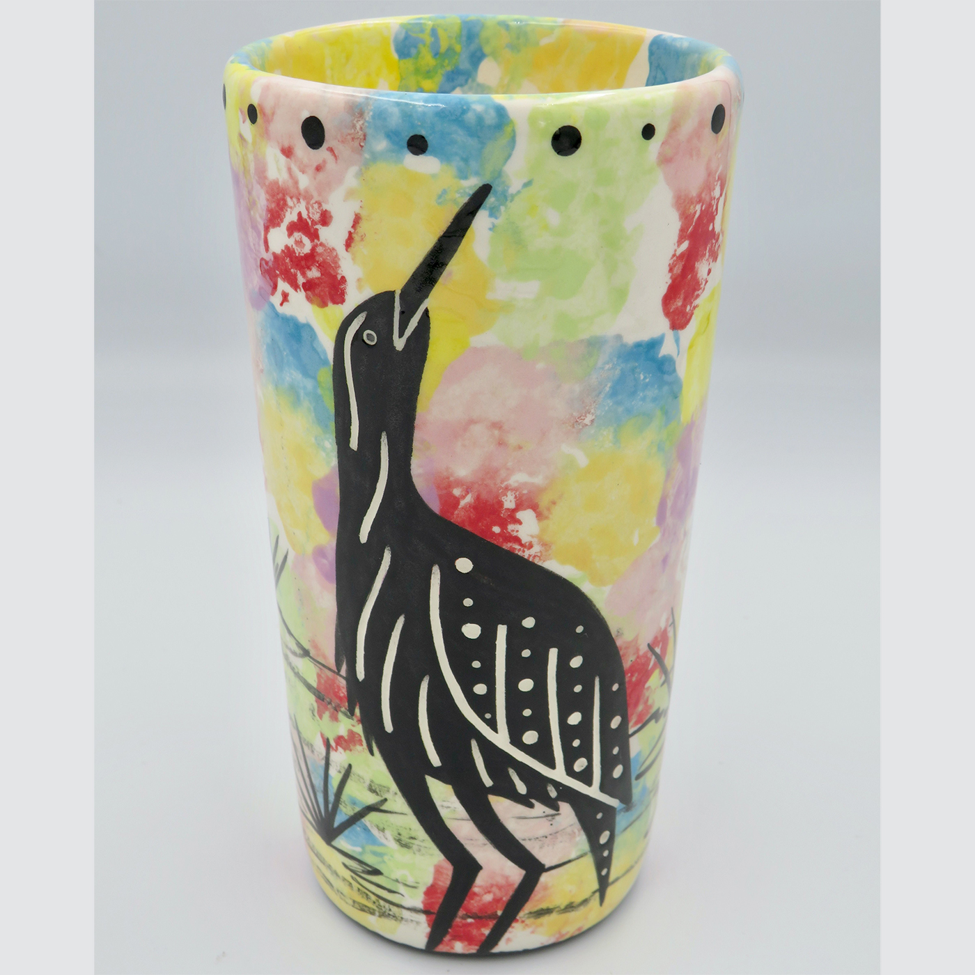 Mana Pottery tumbler featuring bittern with desert landscape on reverse.