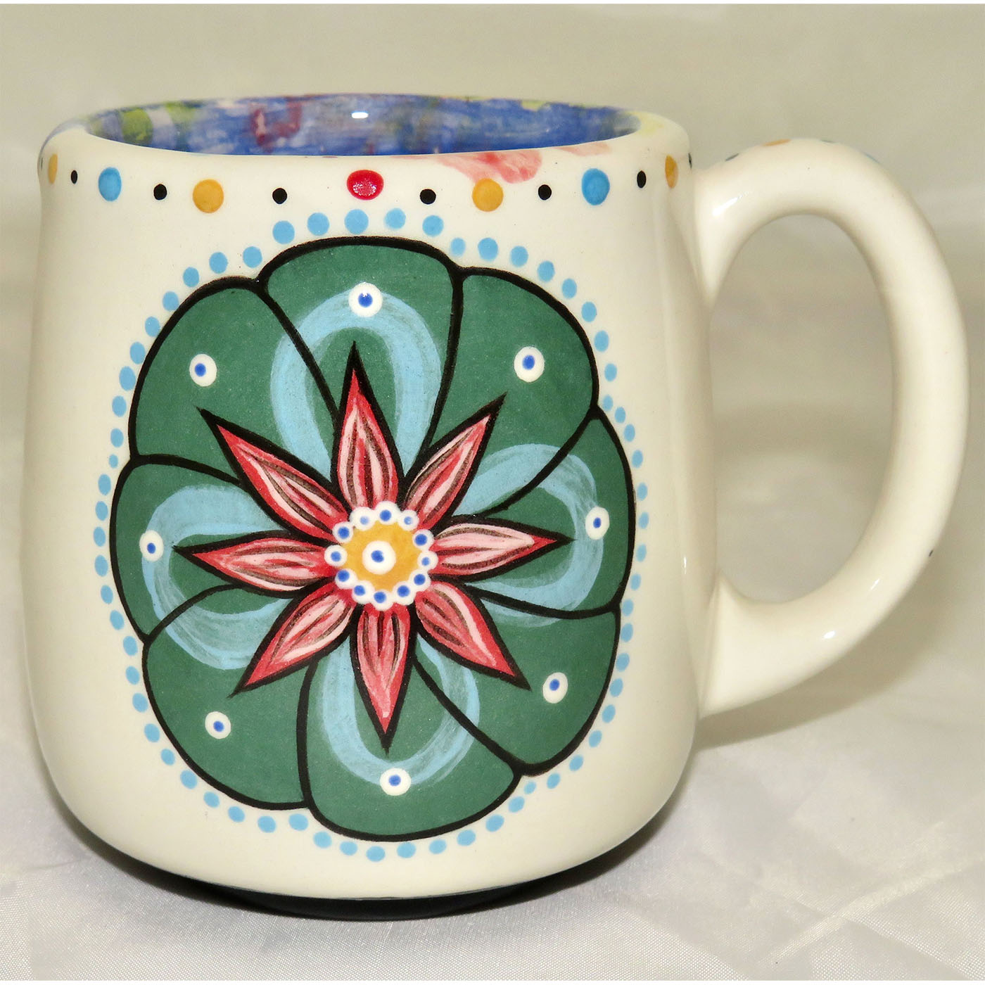 Mana Pottery country cup featuring Peyote and desert vegetation on reverse sides.