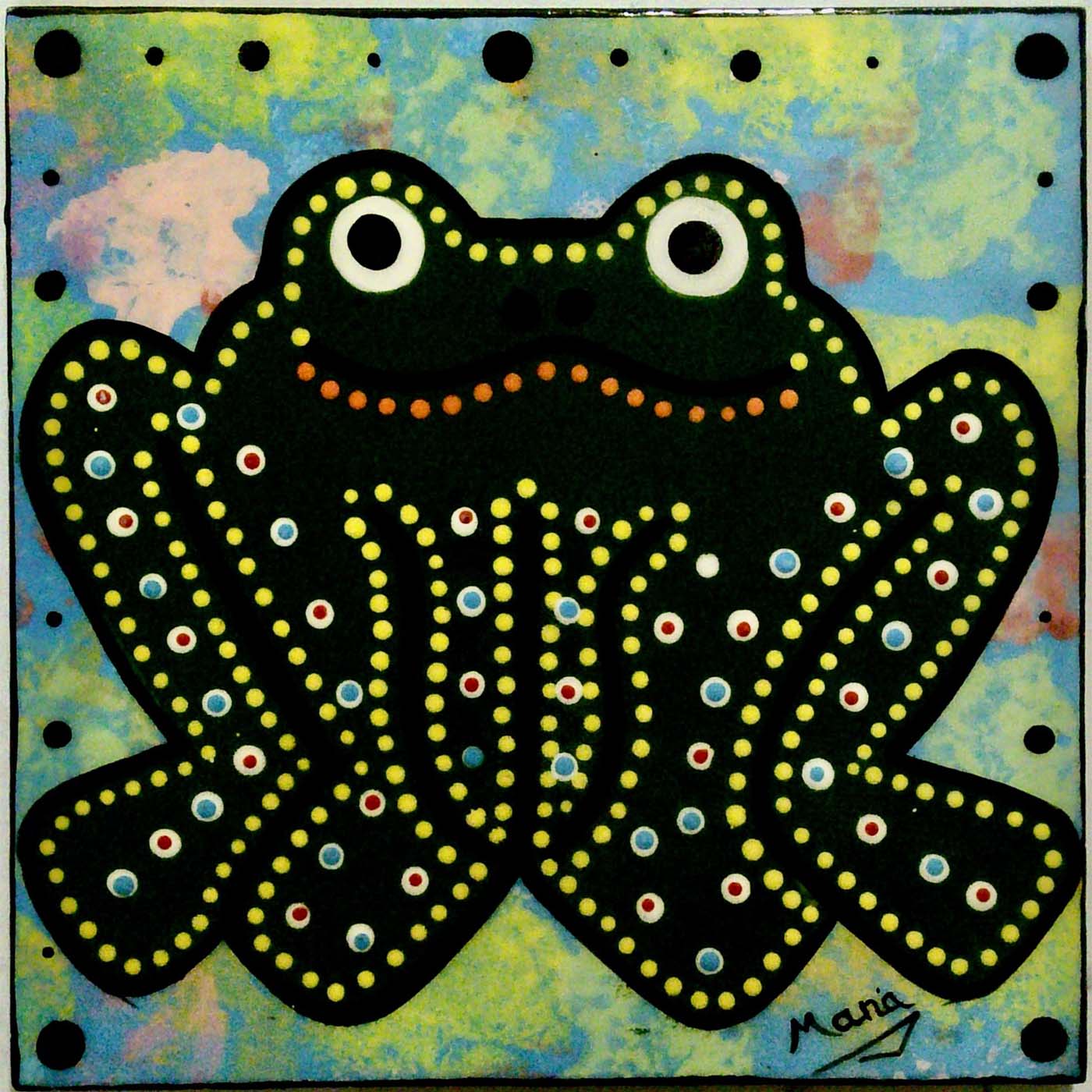 Photo of Mana Pottery 6 inch tile with toad on green background.