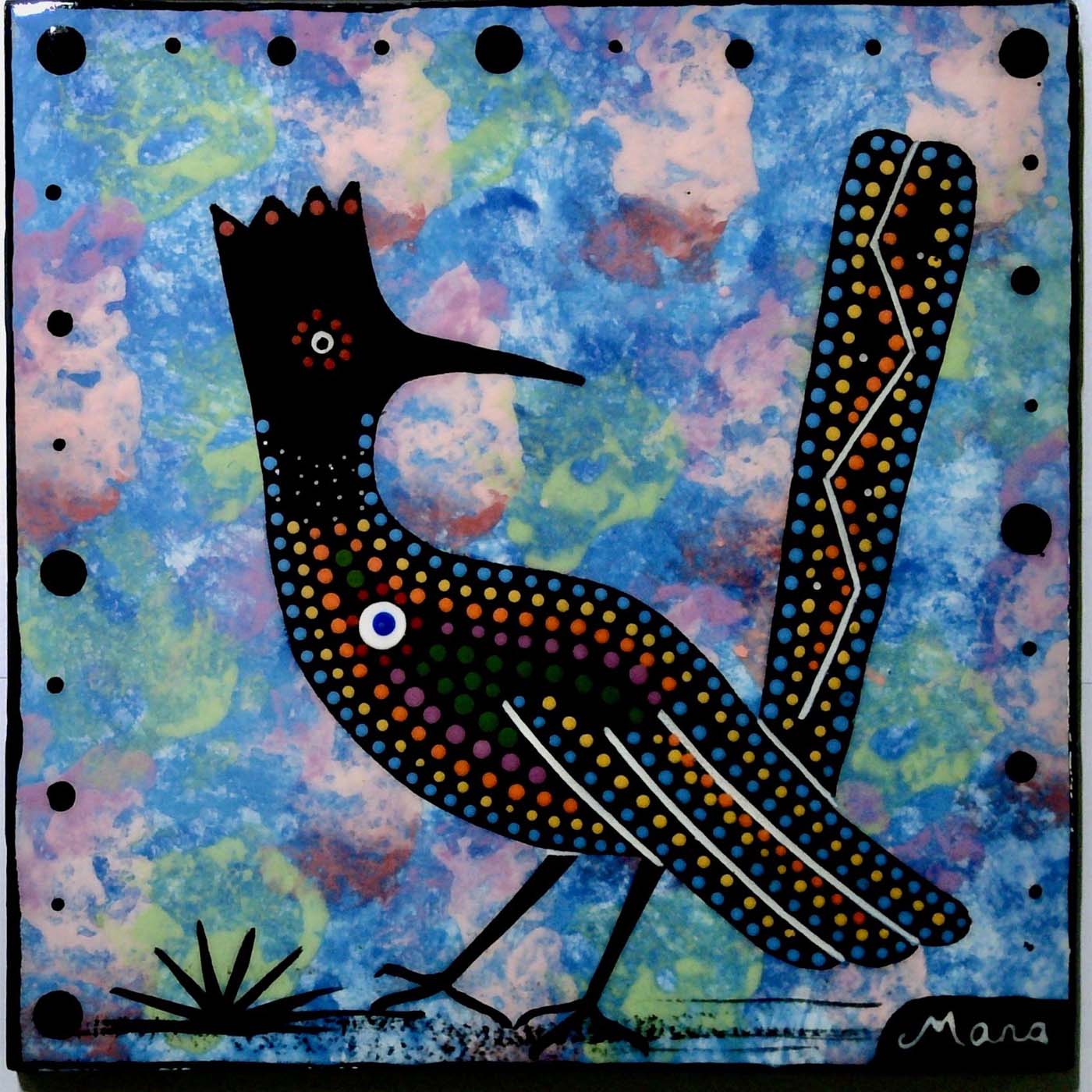 Photo of Mana Pottery 6 inch tile with hummingbird on blue background.