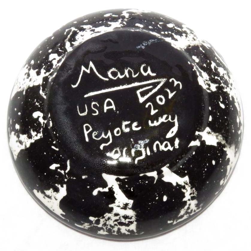 Image of Mana Pottery Holy Bowl featuring cat on earth tones with marbled black and white underside.