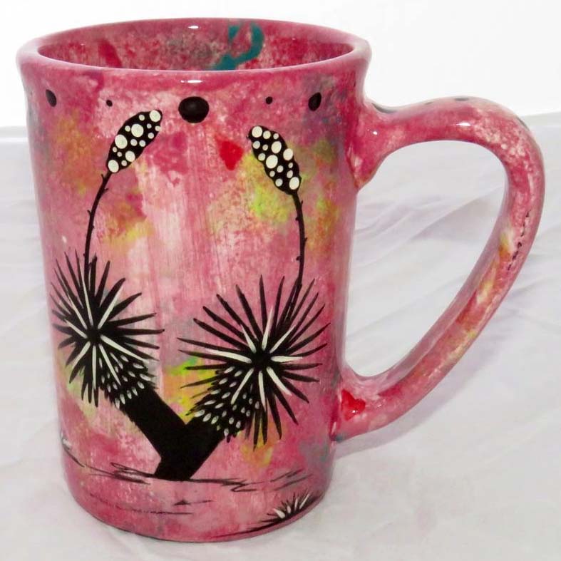 Image of Mana Pottery Large Mug featuring Peyote Guardian Spirit with desert landscape on reverse, on crimson background.
