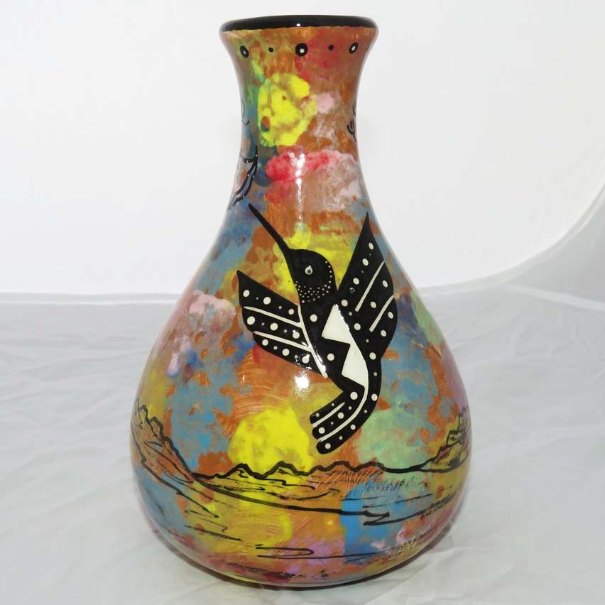 Image of Mana Pottery Teardrop Vase with hummingbirds on reverse sides on earth tones.