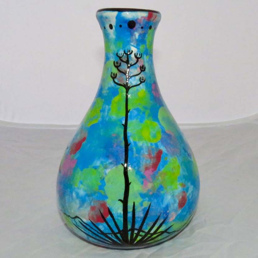 Image of Mana Pottery Teardrop Vase with hummingbirds on reverse sides on turquoise blue. Third view.