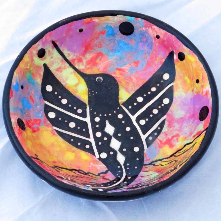 Image of Mana Pottery Holy Bowl featuring hummingbird in dawn sky and black, and white marbled underside.