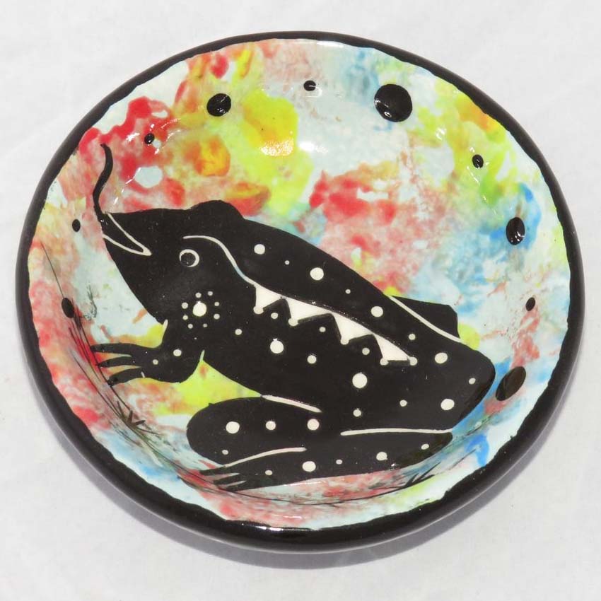 Image of Mana Pottery Holy Bowl featuring toad on confetti background and marbled black and white underside.