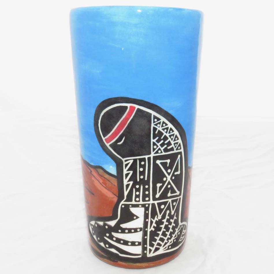 Image of Mana Pottery tumbler featuring Spirit Walker in brilliant blue sky and desert landscape.