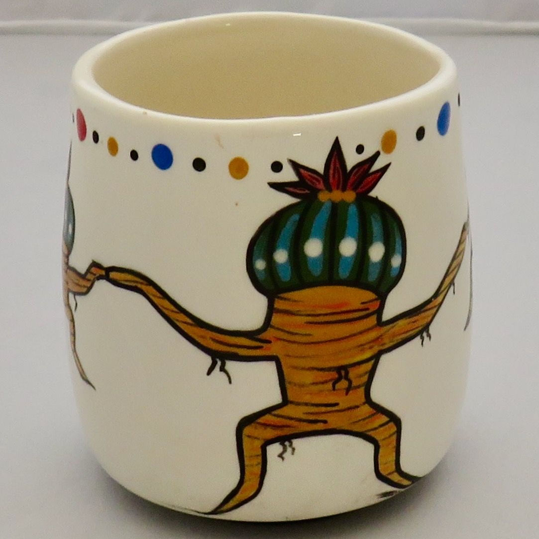 Image of Mana Pottery Country Cup featuring Dancing Peyote Family. No handle.