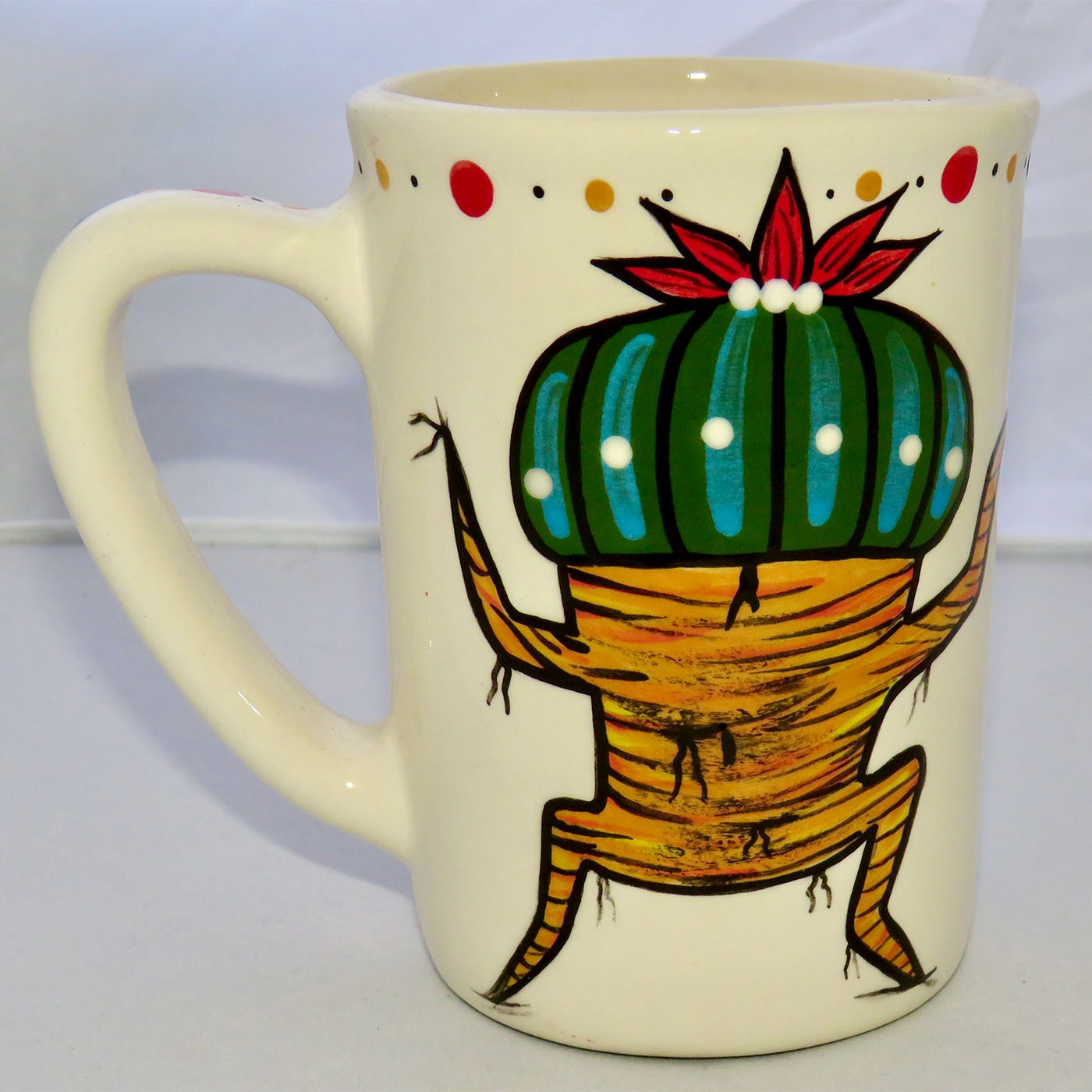 Image of Mana Pottery Large Mug featuring blue Chakra Being on one side and Dancing Peyote on the other.