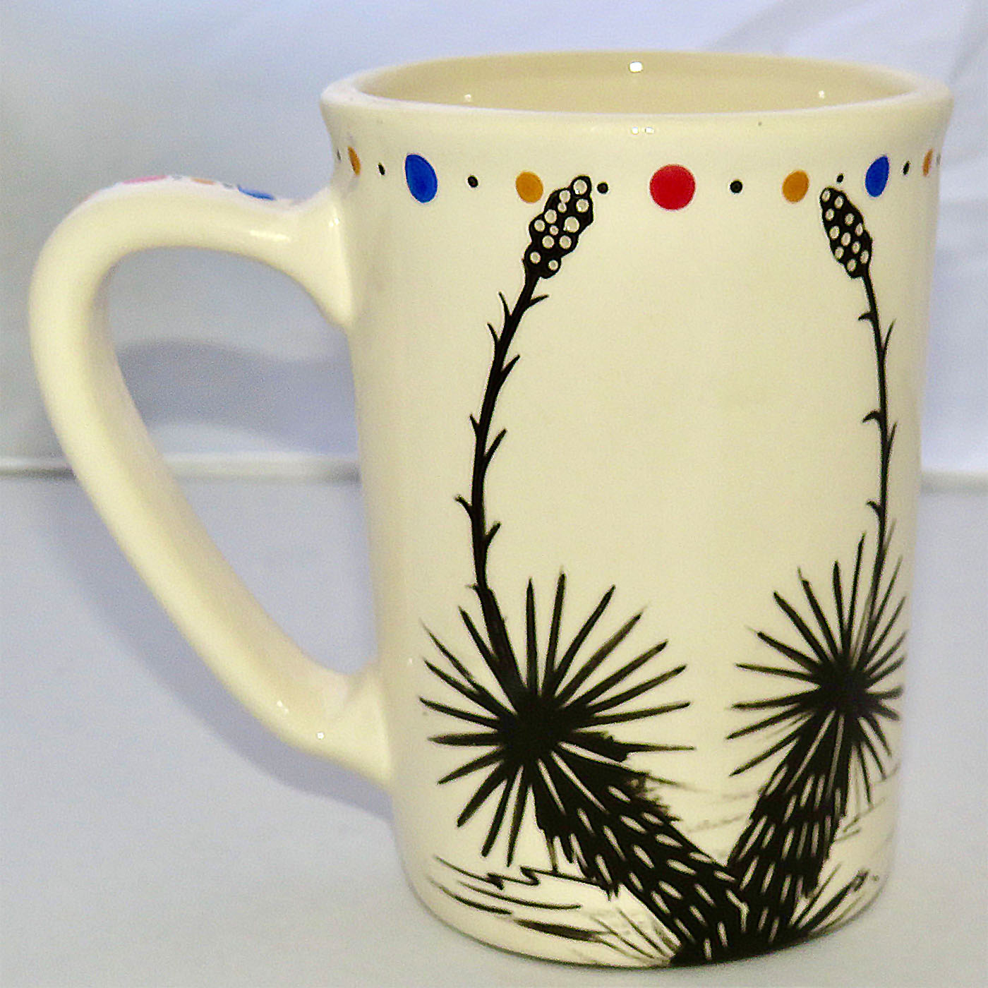 Image of Mana Pottery Large Mug featuring Dancing Peyote on one side and desert vegetation on reverse.