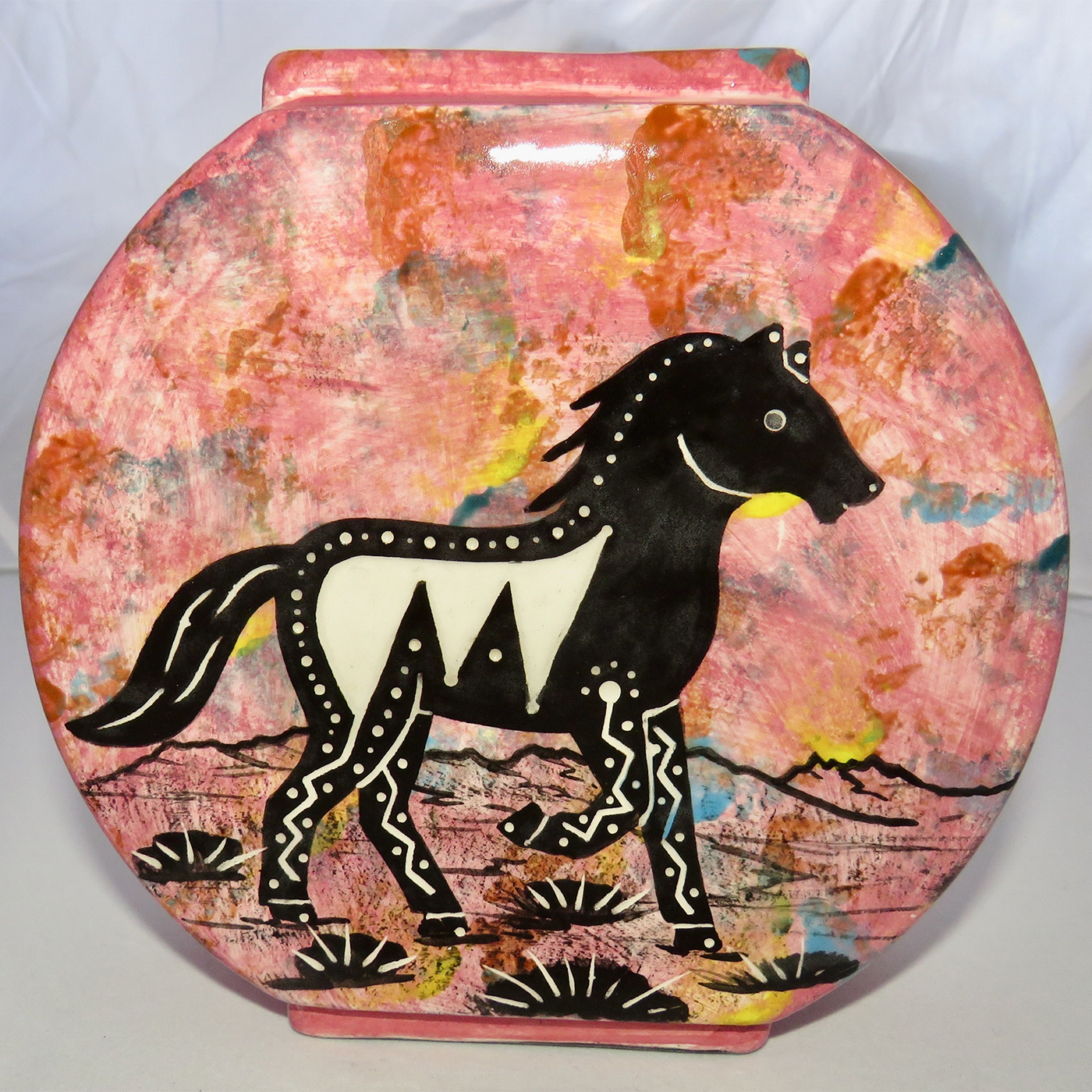 Image of Mana Pottery Pillow Vase featuring bear and horse on reverse sides, on rose background.