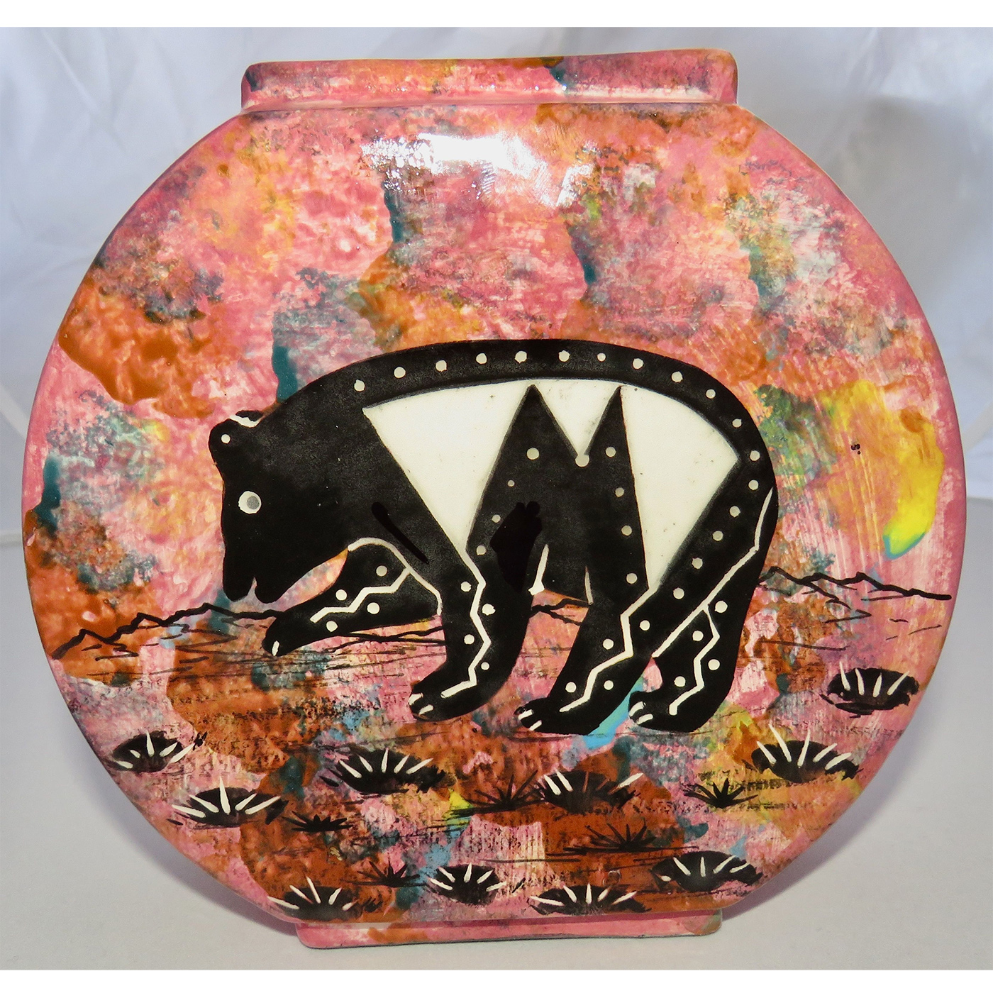 Image of Mana Pottery Pillow Vase featuring bear and horse on reverse sides, on rose background.
