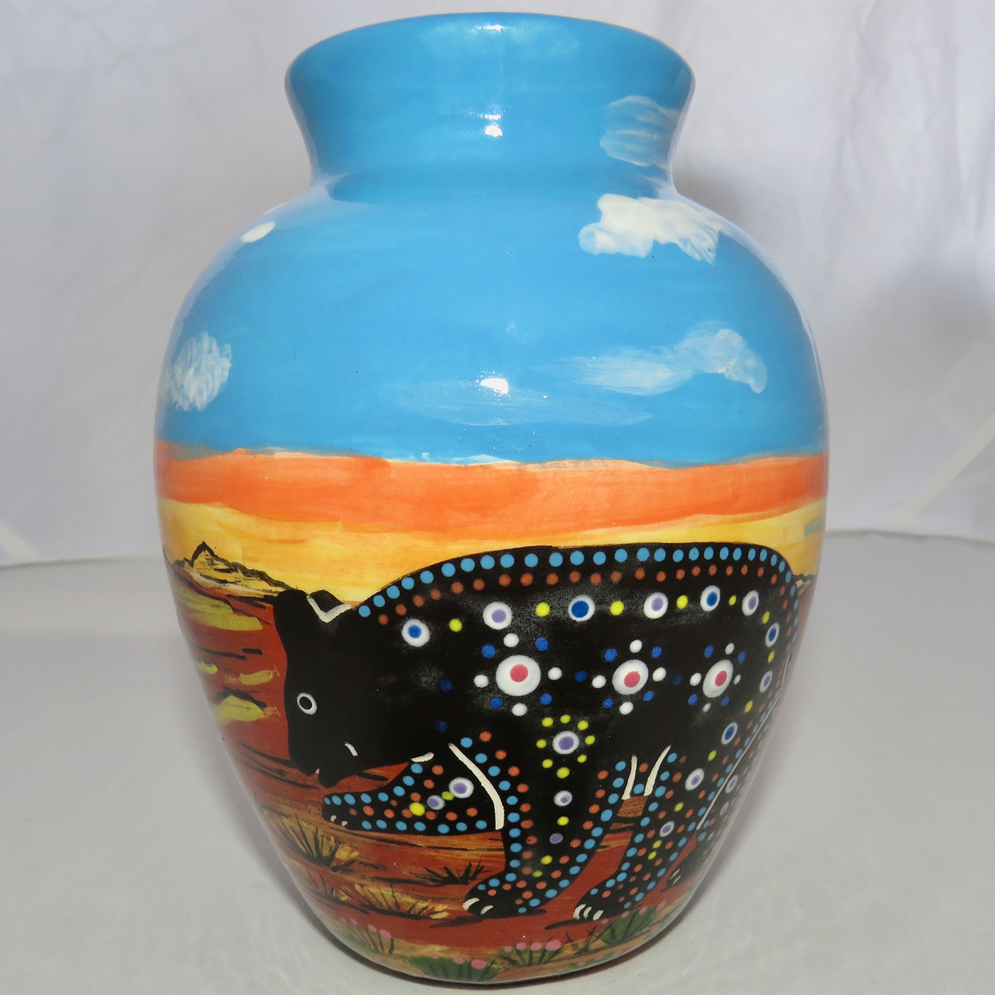 Mana Pottery Six Inch Vase featuring bear against desert earth and sky at glorious cusp of day.