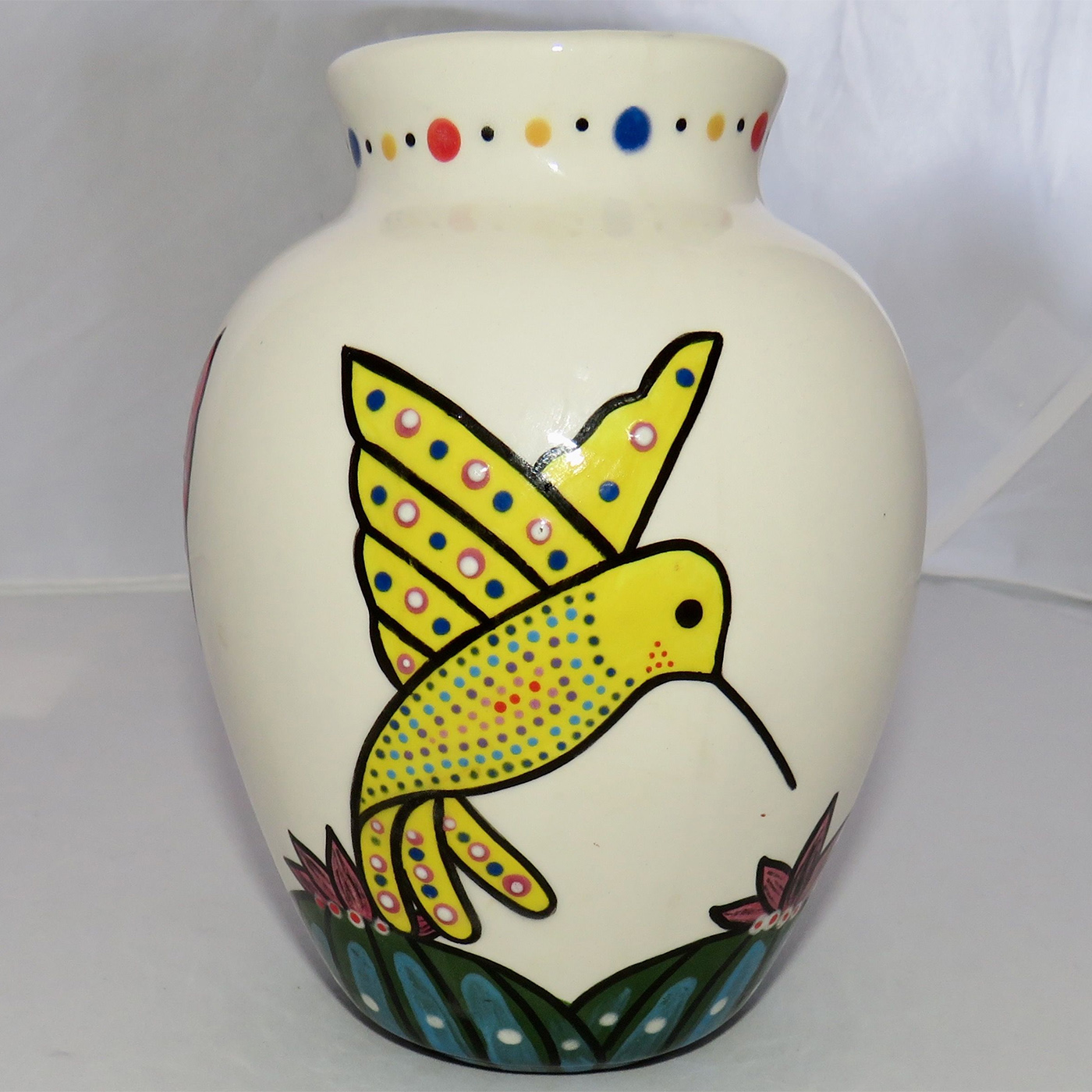 Mana Pottery Six Inch Vase featuring blue and red hummingbirds sipping from the peyote blossoms