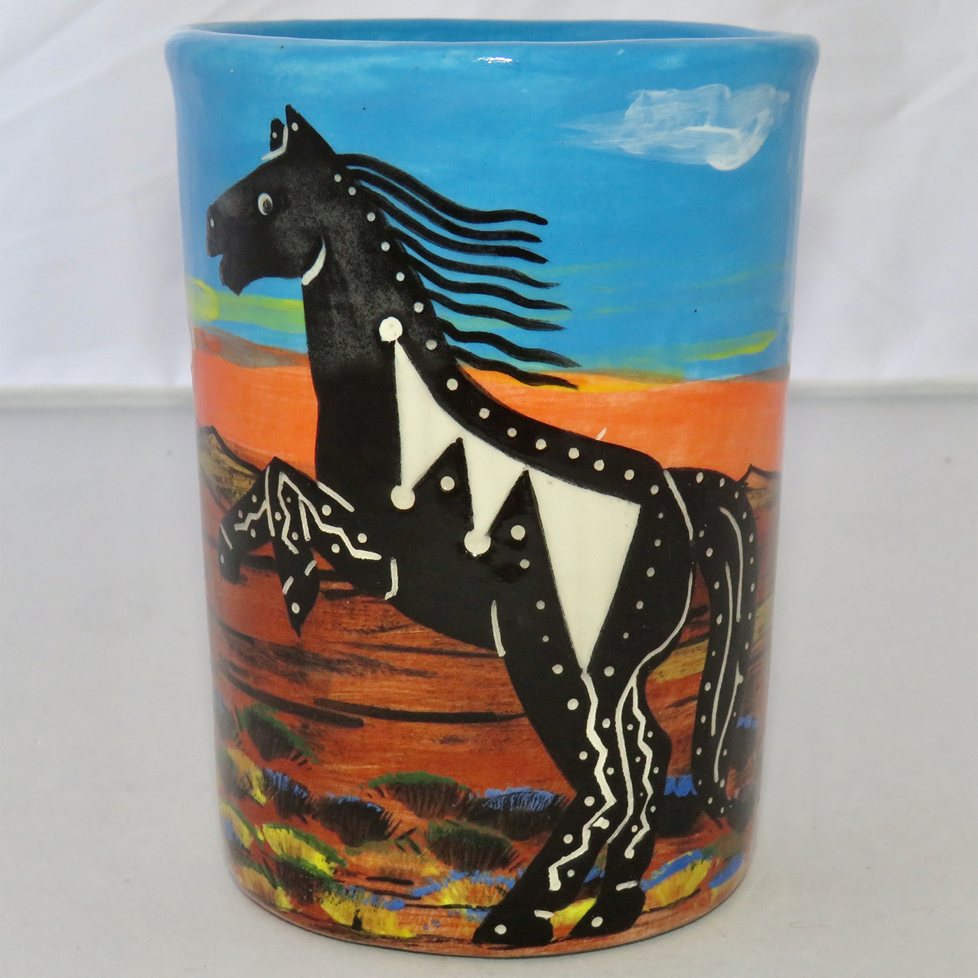 Mana Pottery Five Inch Tumbler featuring horse against backdrop of desert and sky at glorious cusp of day.