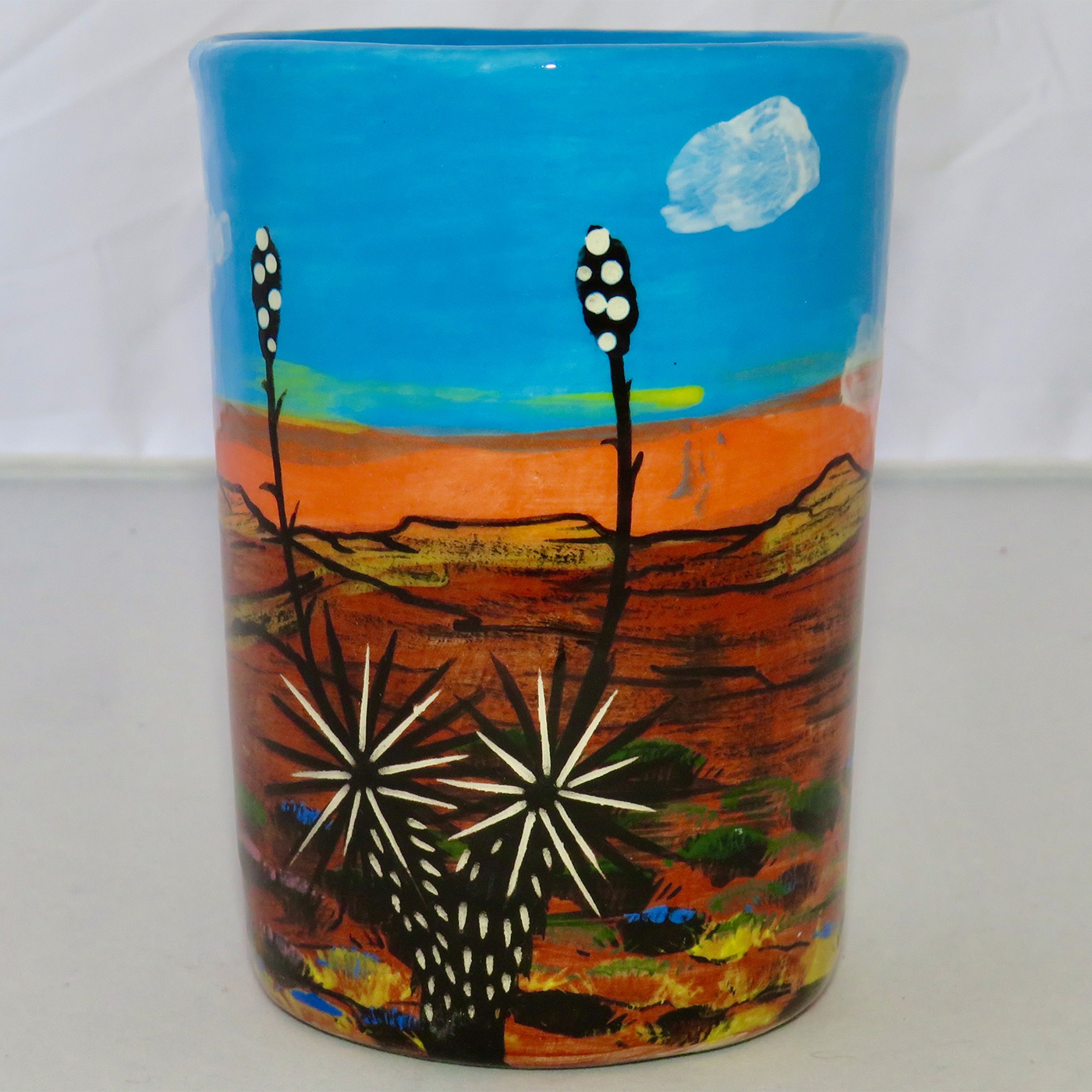 Mana Pottery Five Inch Tumbler featuring horse against backdrop of desert and sky at glorious cusp of day.